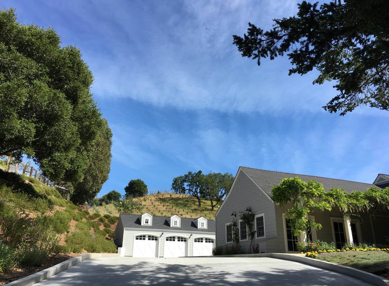 1075 Godetia Drive Woodside, CA 94062 - Photo 30 of 33 a view of a house with a yard