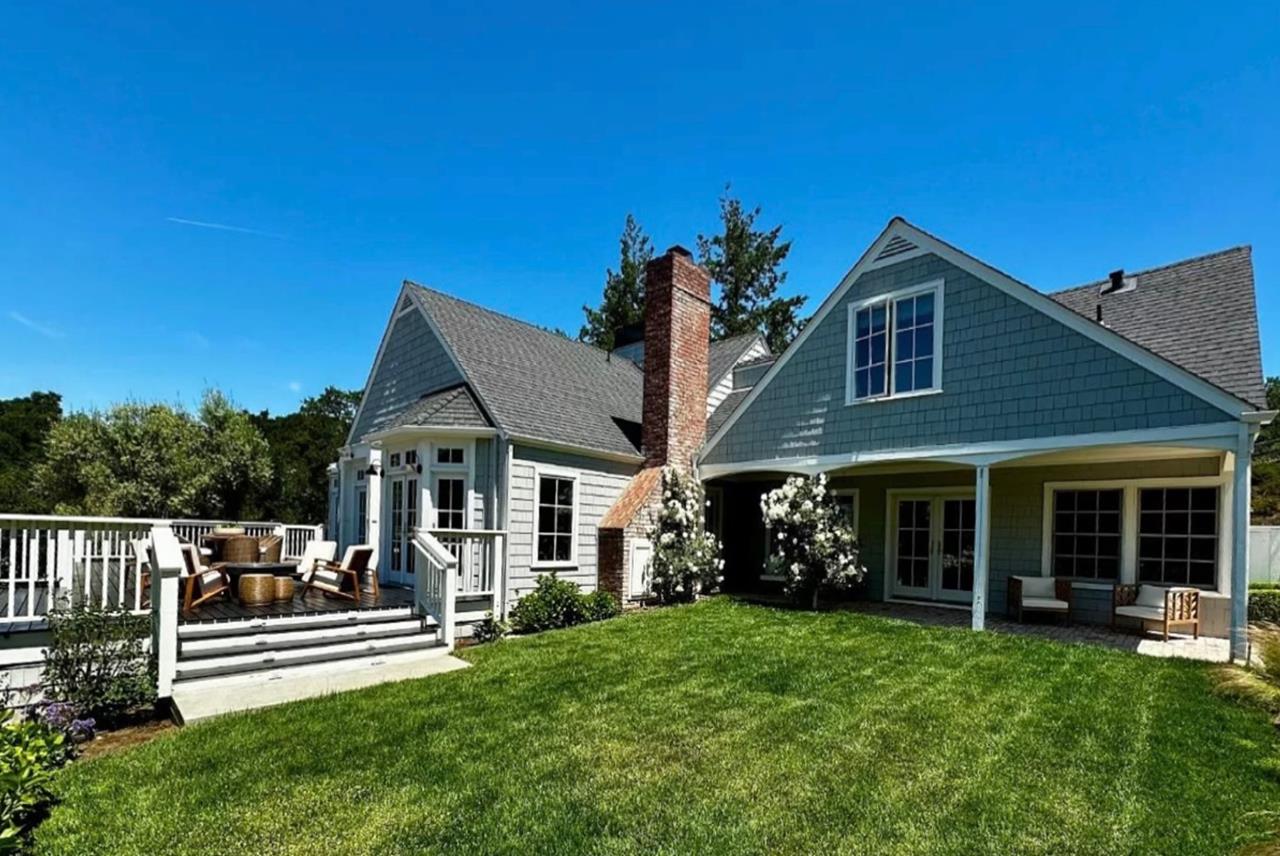 1075 Godetia Drive Woodside, CA 94062 - Photo 4 of 33 a front view of a house with a porch