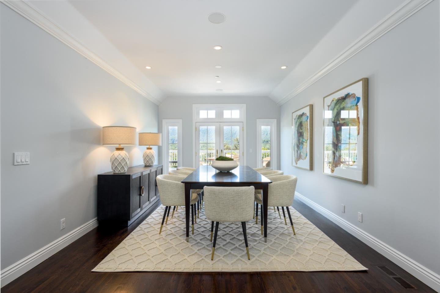 1075 Godetia Drive Woodside, CA 94062 - Photo 8 of 33 a dining room with wooden floor and a table