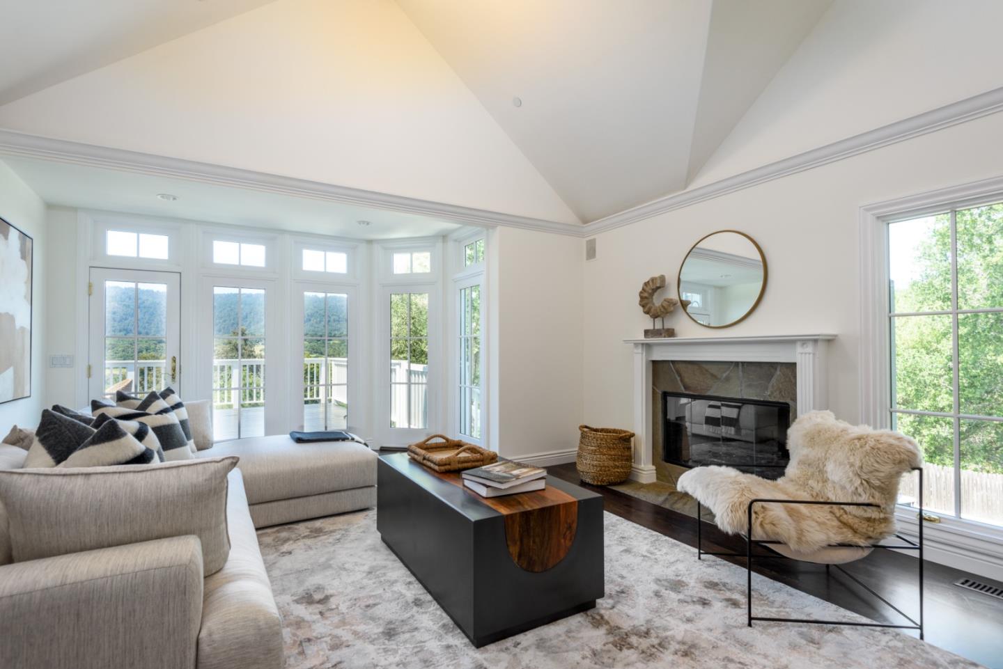 1075 Godetia Drive Woodside, CA 94062 - Photo 10 of 33 a living room with furniture and a fireplace