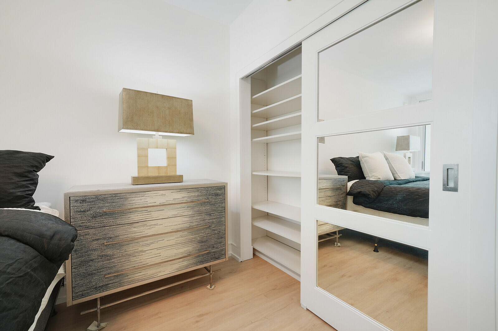 550 Southeast Mizner Boulevard, Unit B209 Boca Raton, FL 33432 - Photo 26 of 78 a view of bedroom with furniture and lamp