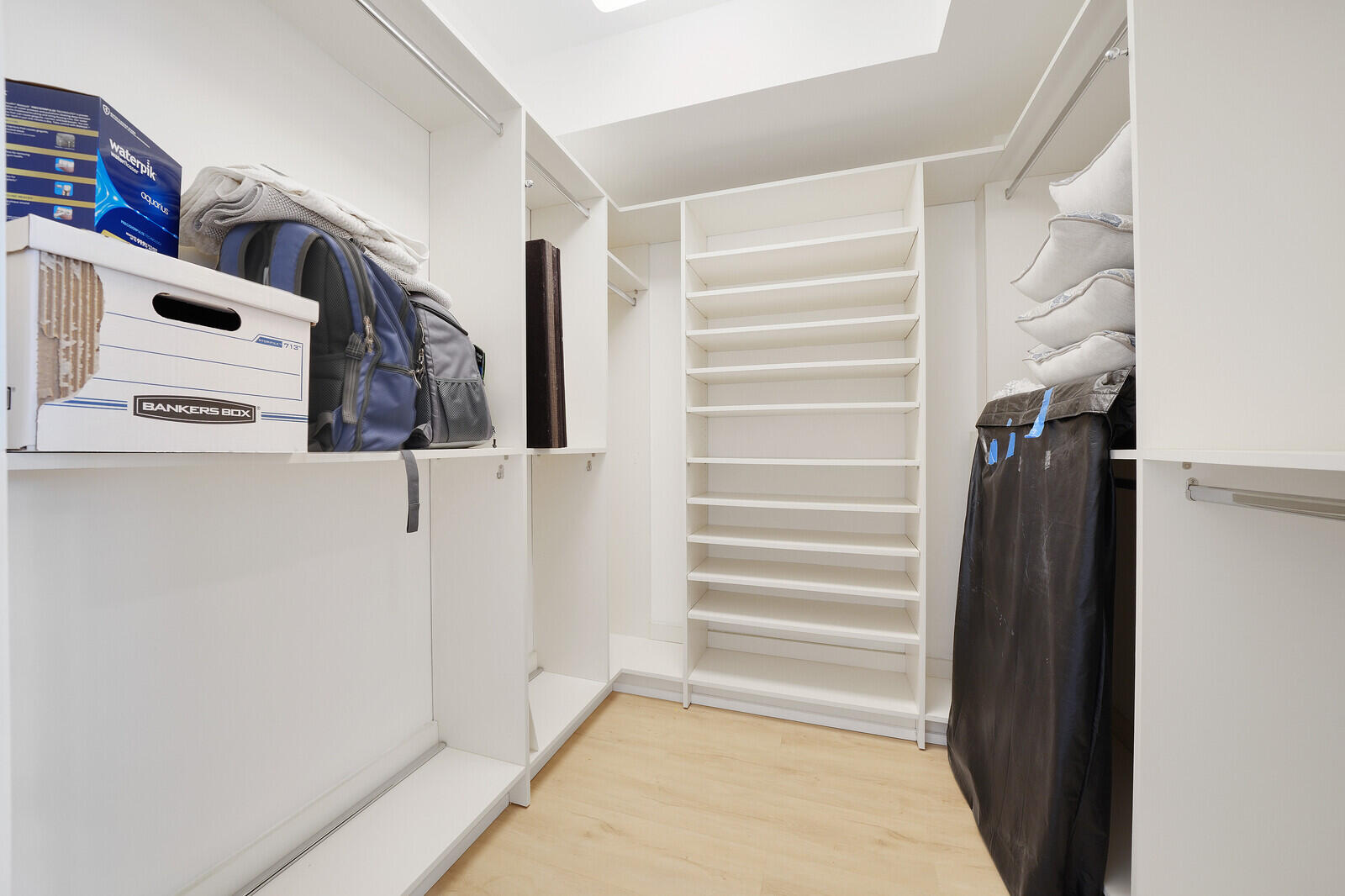 550 Southeast Mizner Boulevard, Unit B209 Boca Raton, FL 33432 - Photo 27 of 78 a view of walk in closet with clothes and shoes