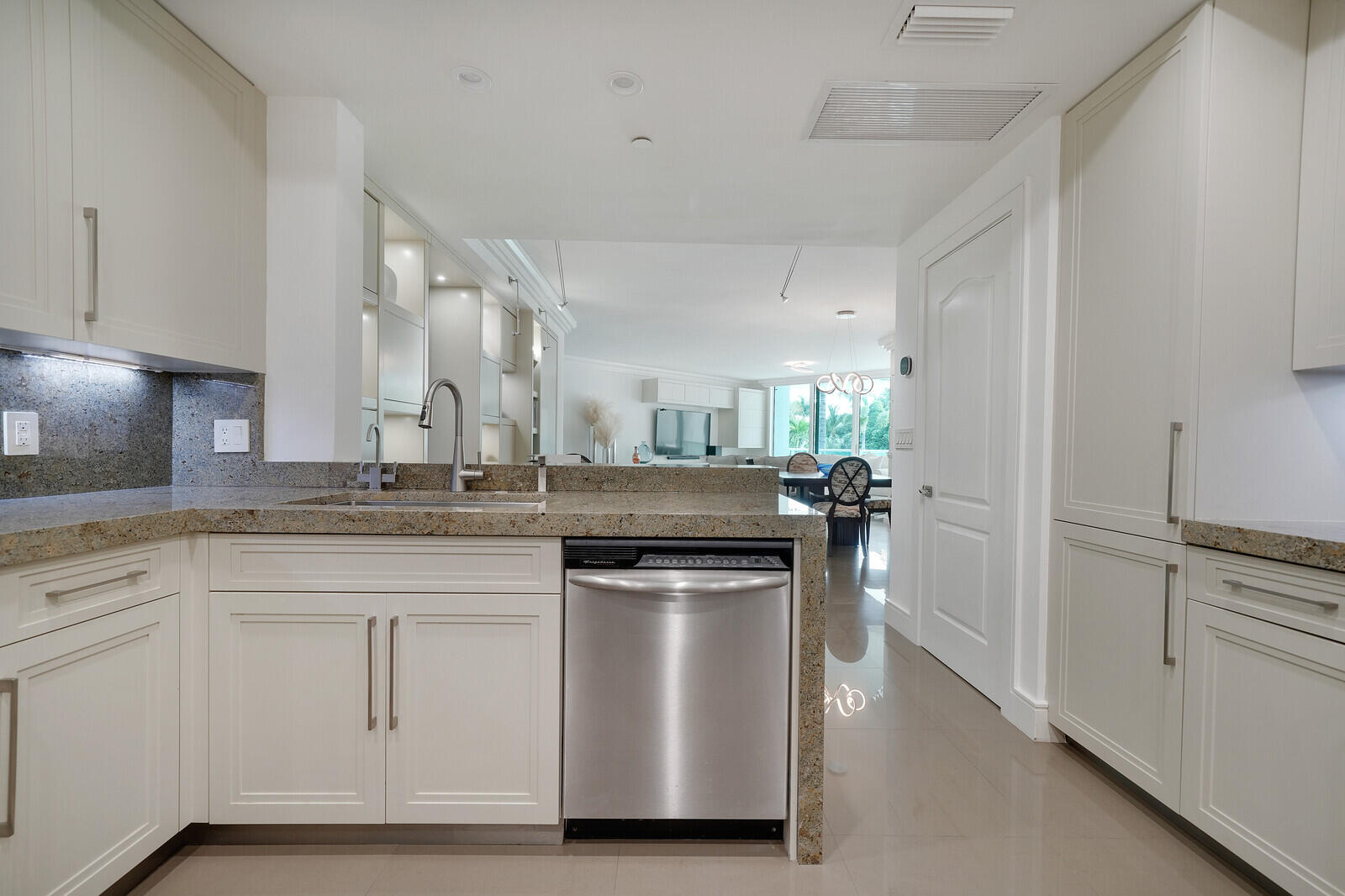 550 Southeast Mizner Boulevard, Unit B209 Boca Raton, FL 33432 - Photo 29 of 78 a kitchen with stainless steel appliances granite countertop a stove and a sink