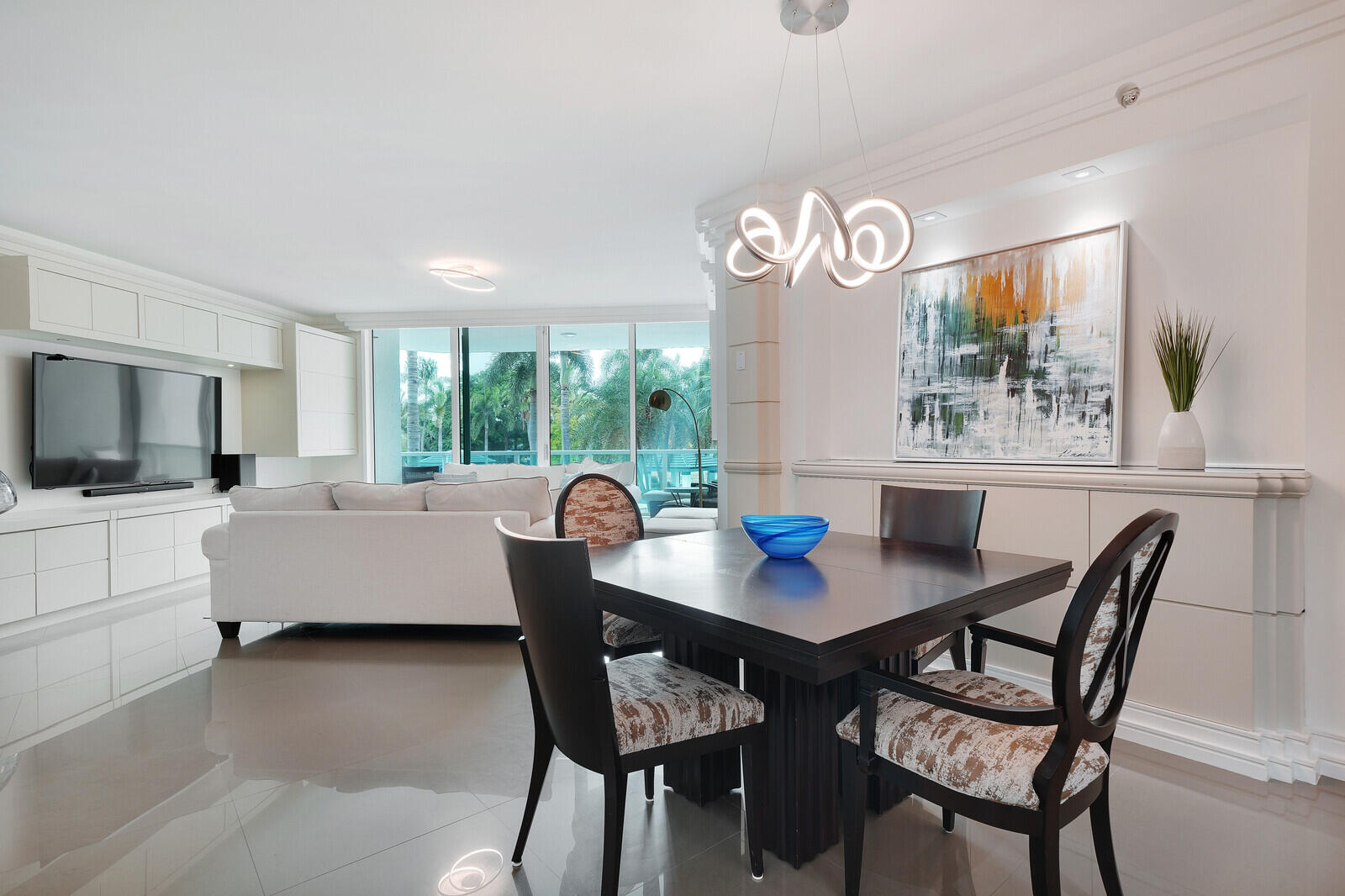 550 Southeast Mizner Boulevard, Unit B209 Boca Raton, FL 33432 - Photo 10 of 78 a view of a dining room with furniture window and wooden floor