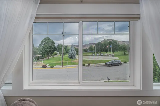 a view of a room that has a window