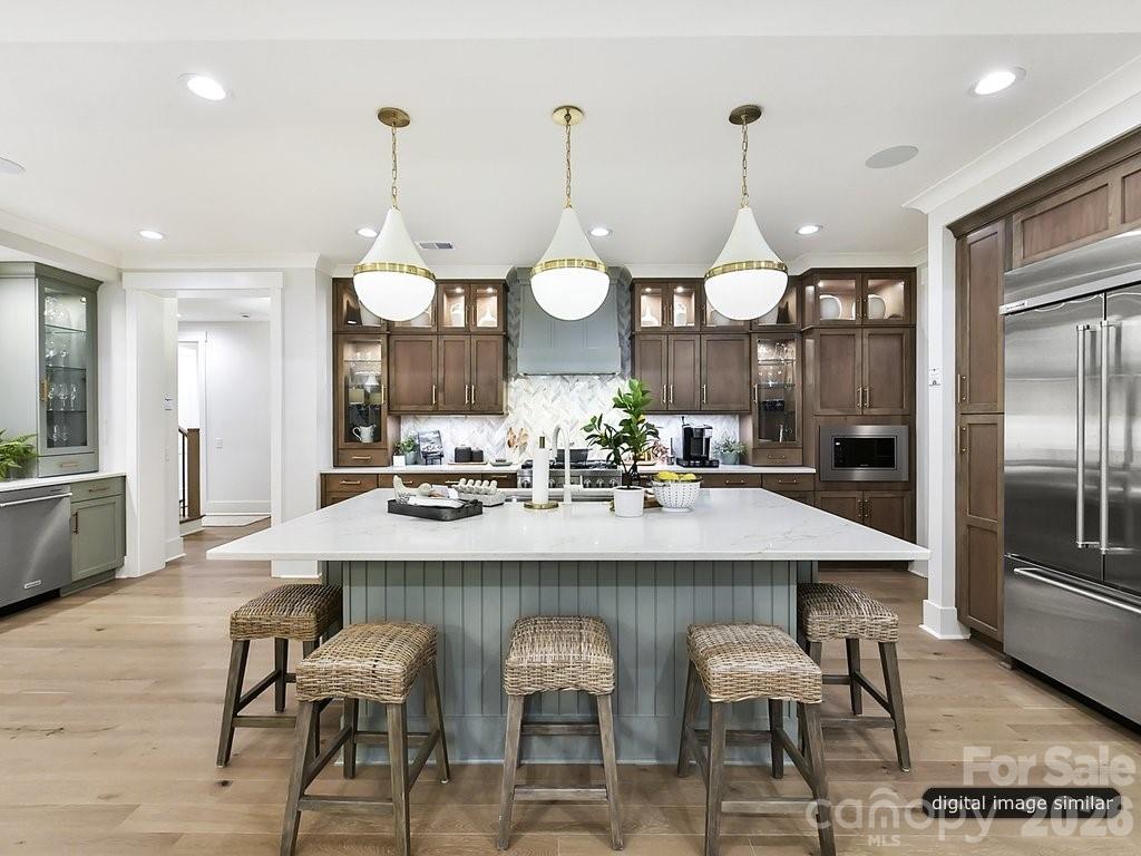 1002 Kingbird Lane, Unit 7 Clover, SC 29710 - Photo 14 of 40 a kitchen with a table and chairs in it