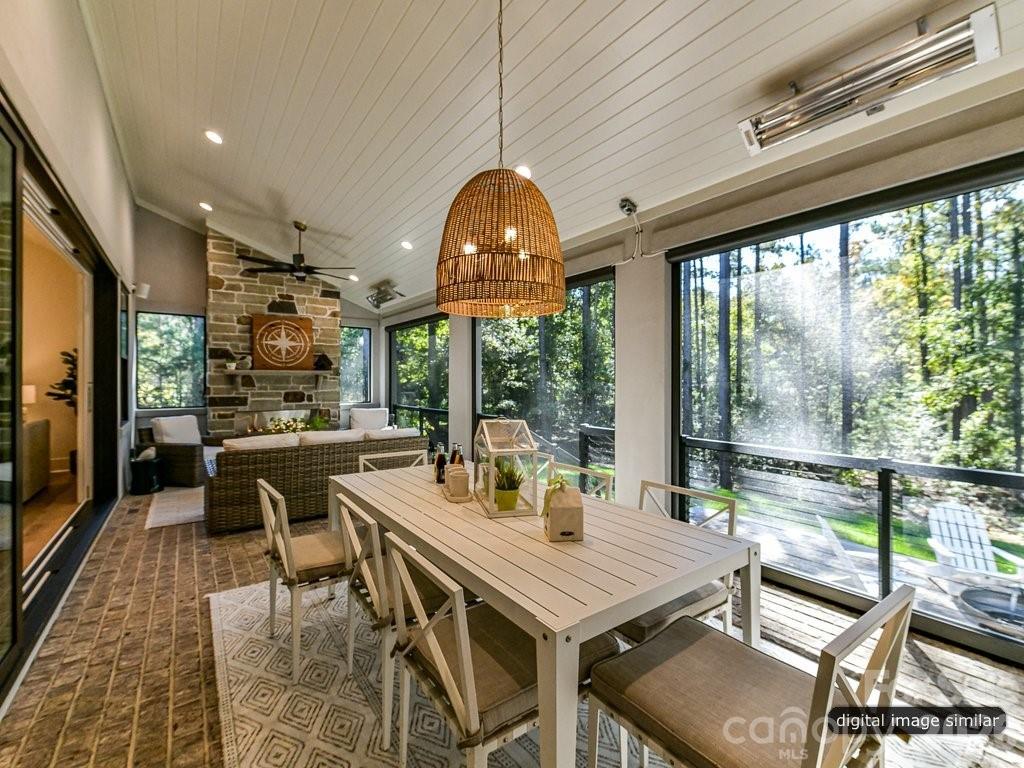 1002 Kingbird Lane, Unit 7 Clover, SC 29710 - Photo 20 of 40 a view of a dining room with furniture window and outside view