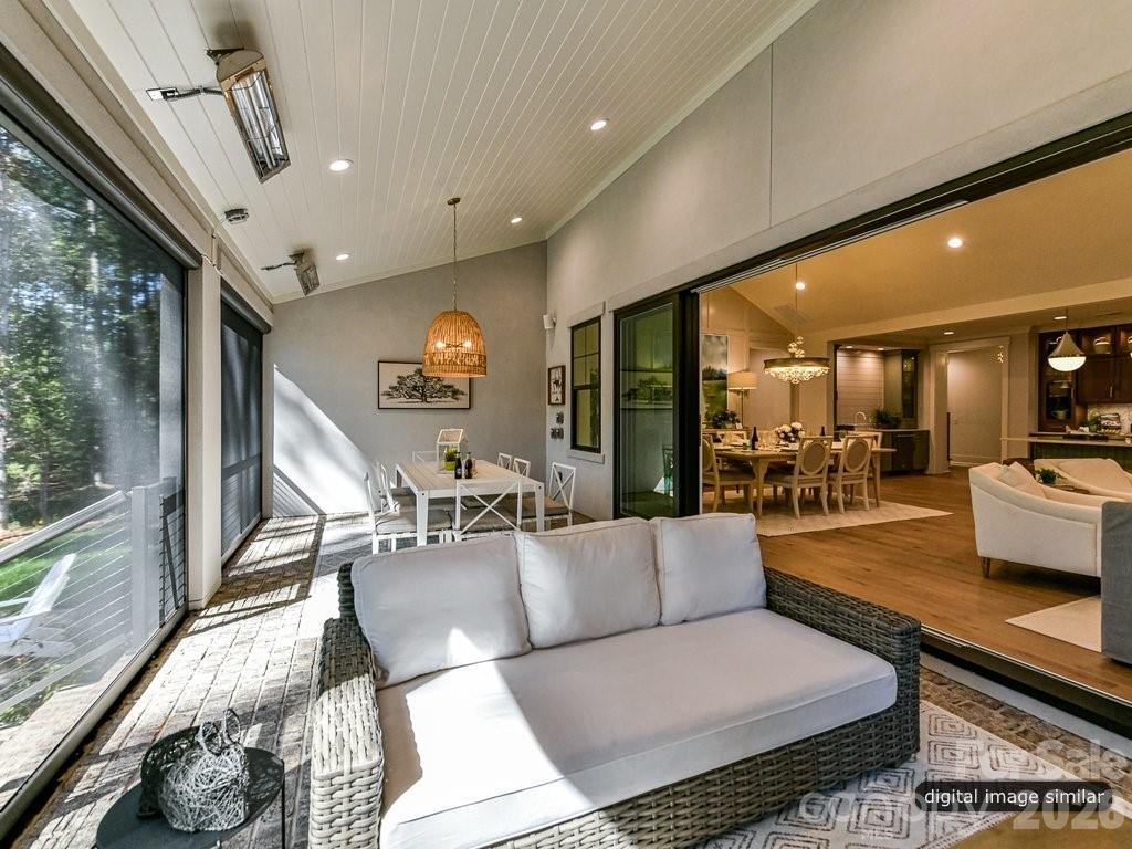 1002 Kingbird Lane, Unit 7 Clover, SC 29710 - Photo 22 of 40 a living room with furniture and a large window