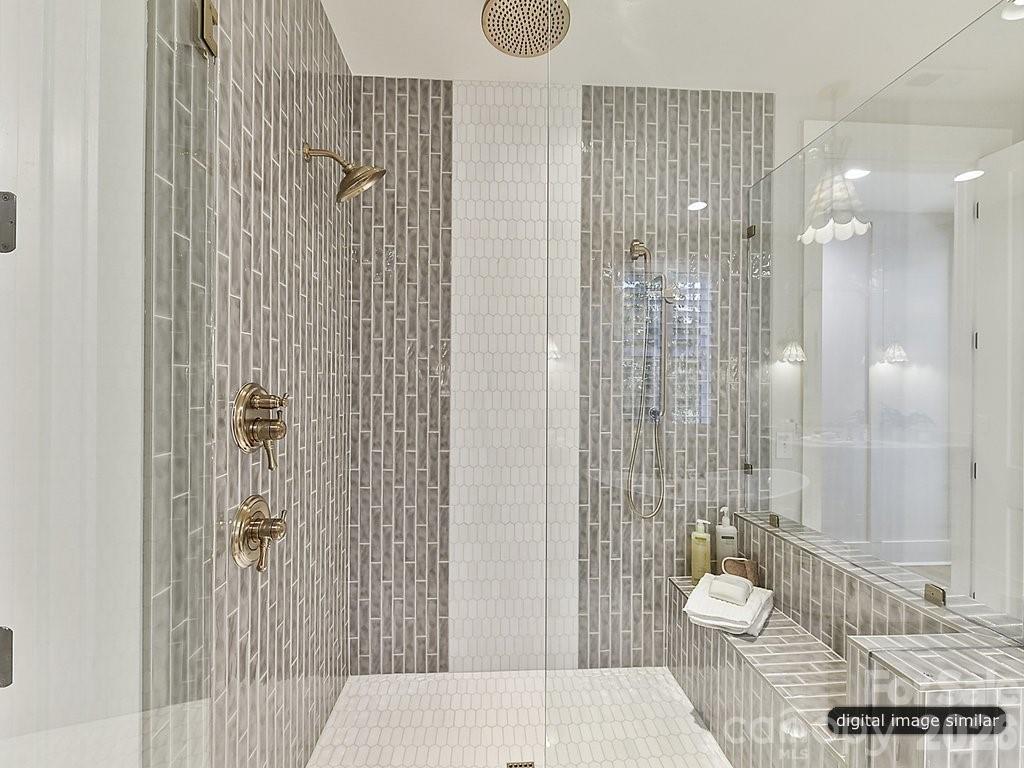 1002 Kingbird Lane, Unit 7 Clover, SC 29710 - Photo 30 of 40 a bathroom with a sink toilet and shower