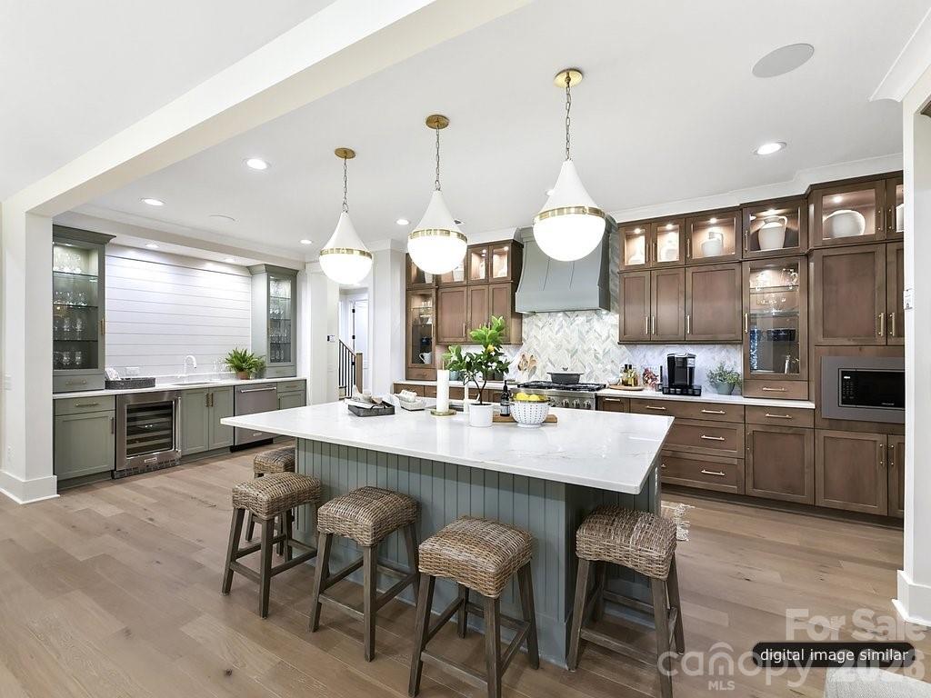 1002 Kingbird Lane, Unit 7 Clover, SC 29710 - Photo 10 of 40 a large kitchen with a table and chairs