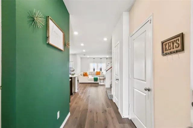 a view of a living room and bathroom