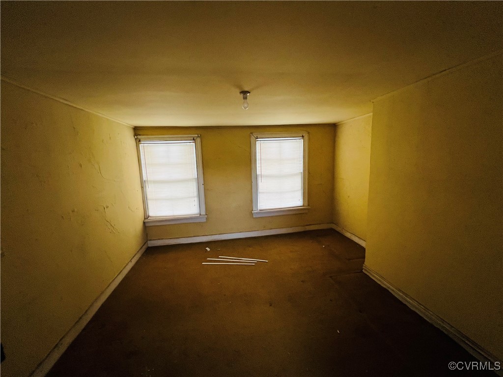 20253 Frog Level Road Ruther Glen, VA 22546 - Photo 8 of 14 Unfurnished room featuring baseboards