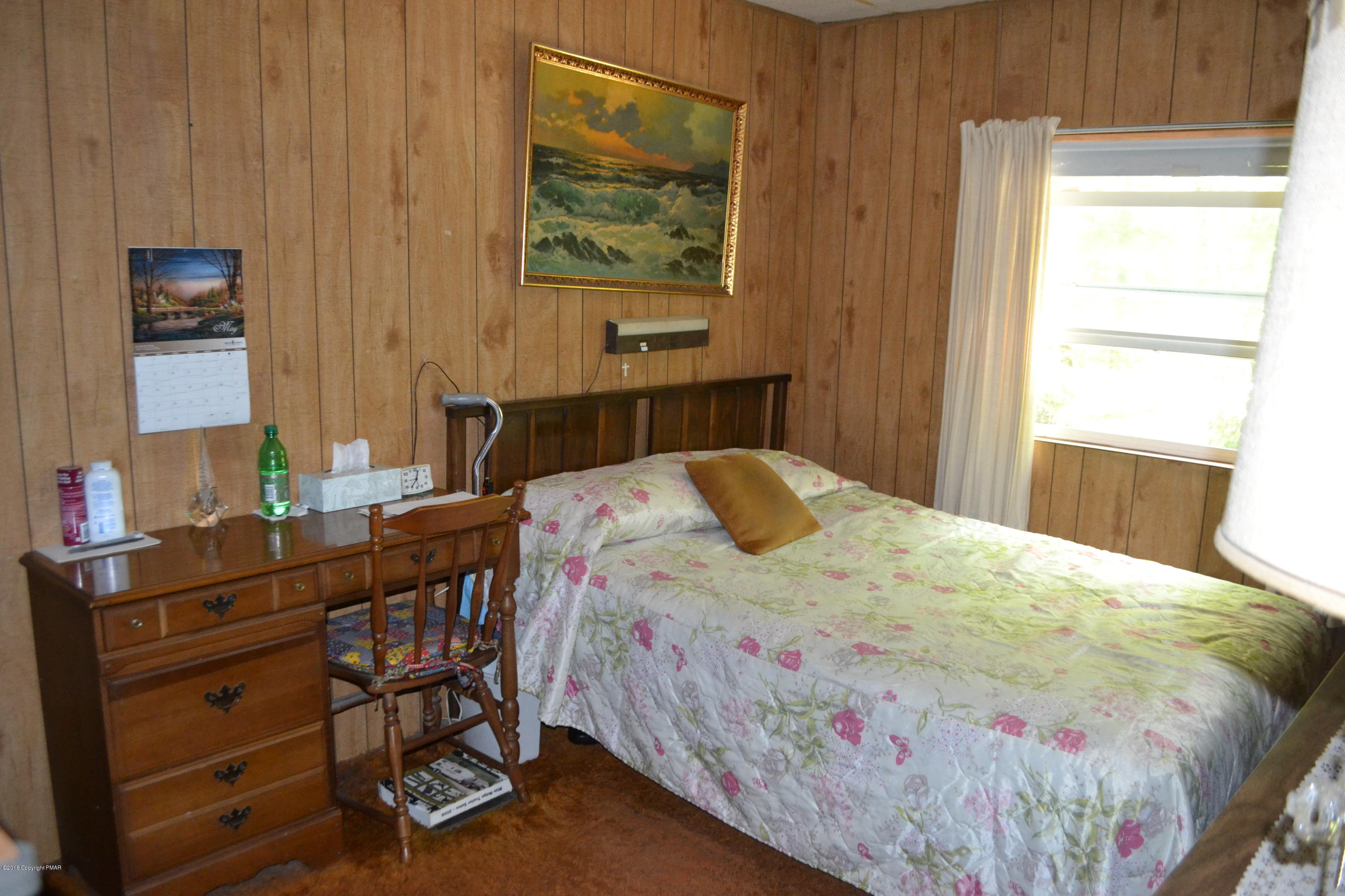 130 Stadden Road Stroudsburg, PA 18360 - Photo 18 of 24 a bedroom with a bed and a dresser in it