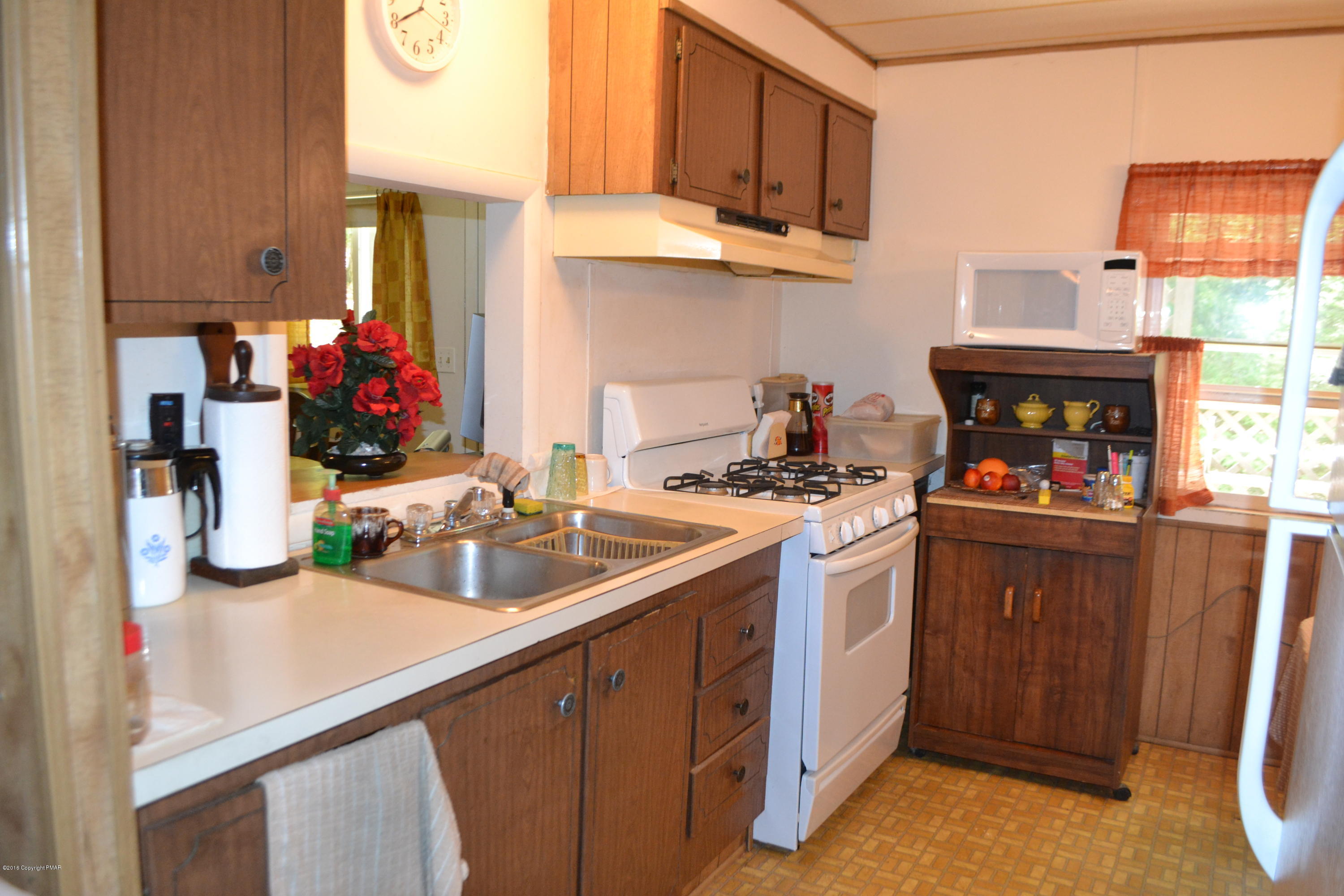 130 Stadden Road Stroudsburg, PA 18360 - Photo 20 of 24 a kitchen with stainless steel appliances granite countertop a sink and cabinets
