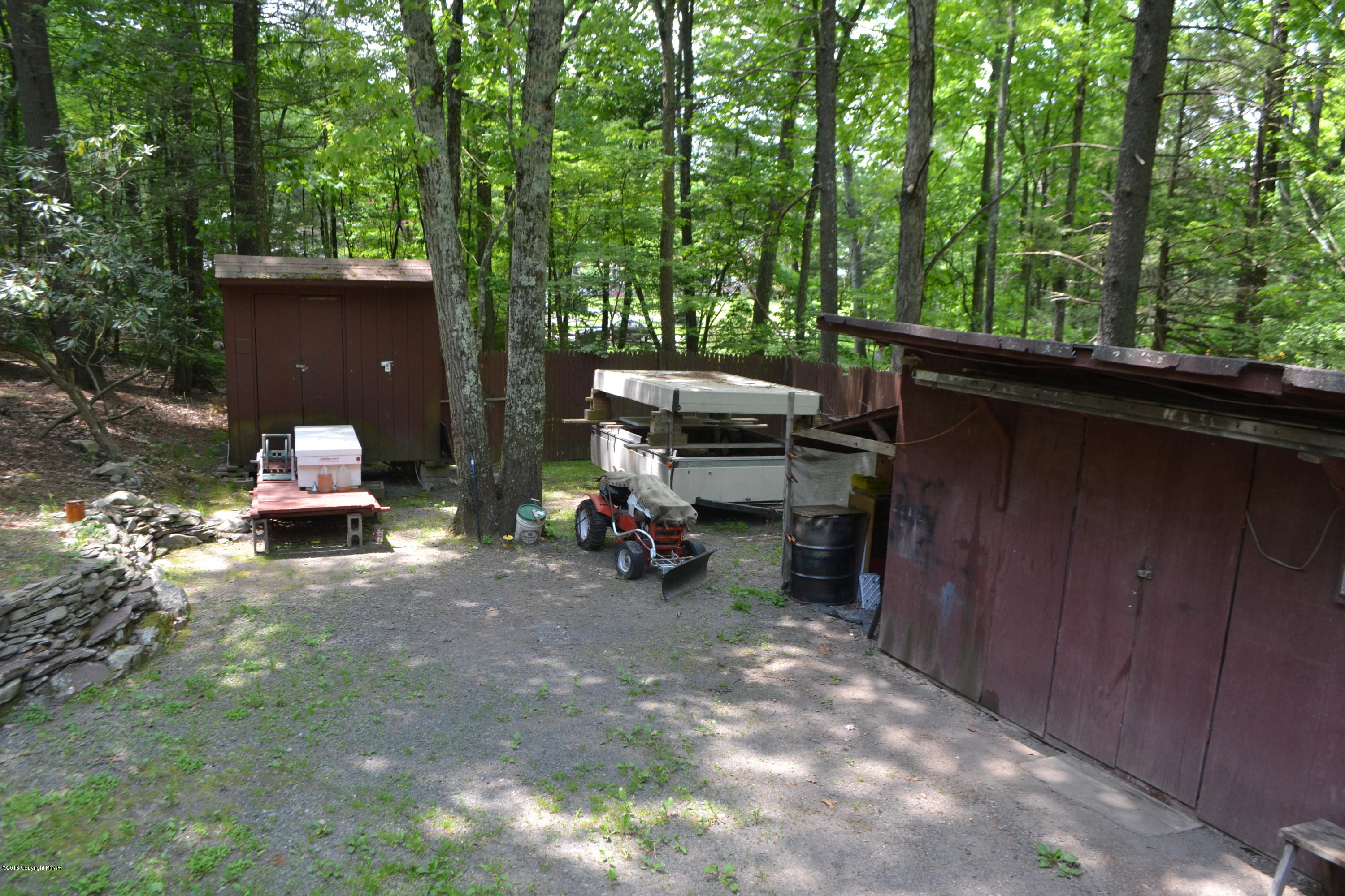 130 Stadden Road Stroudsburg, PA 18360 - Photo 22 of 24 a backyard of a house with seating space