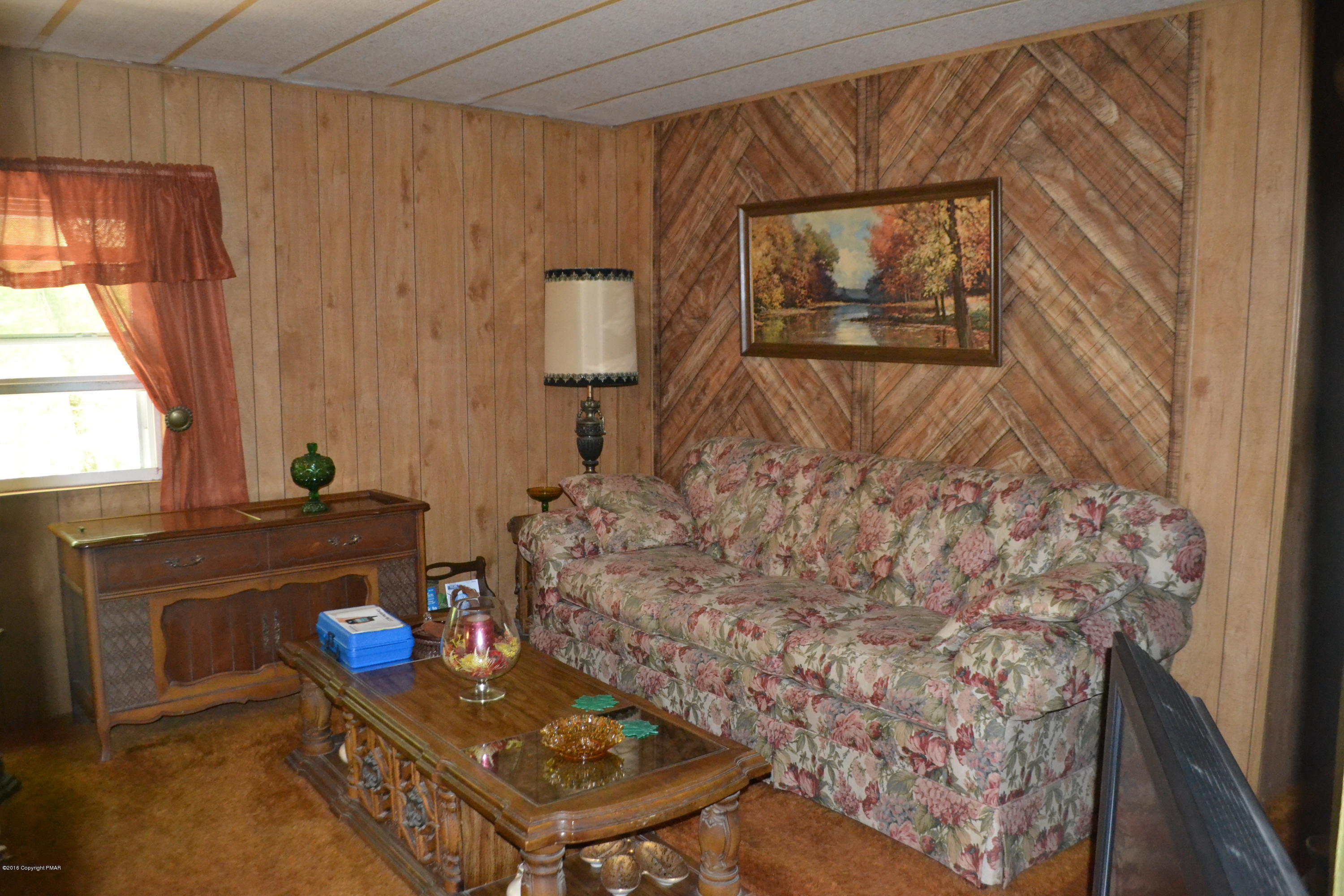 130 Stadden Road Stroudsburg, PA 18360 - Photo 9 of 24 a living room with furniture and a window