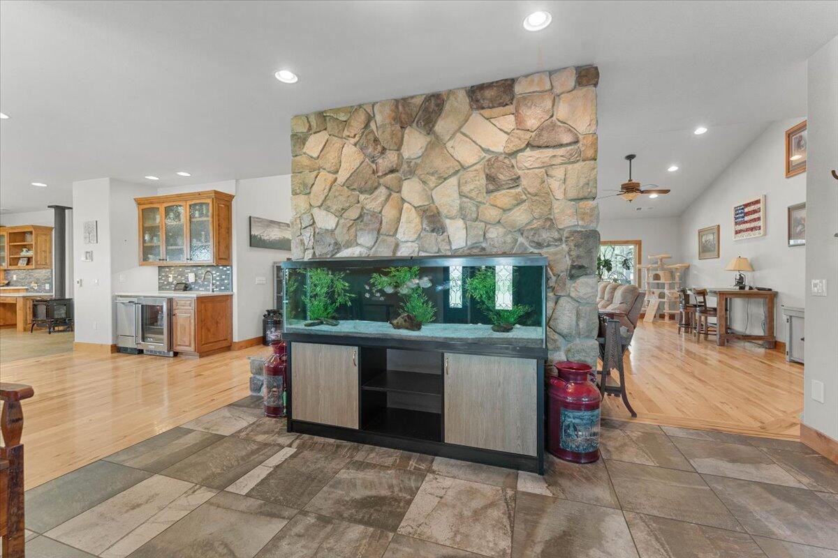41494 Gomez Road Fall River Mills, CA 96028 - Photo 13 of 92 a living room with furniture and a fireplace