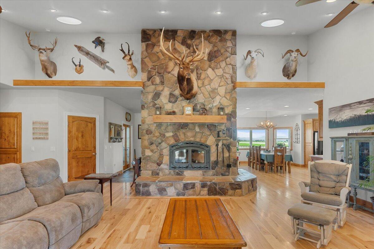 41494 Gomez Road Fall River Mills, CA 96028 - Photo 27 of 92 a living room with furniture and a fireplace