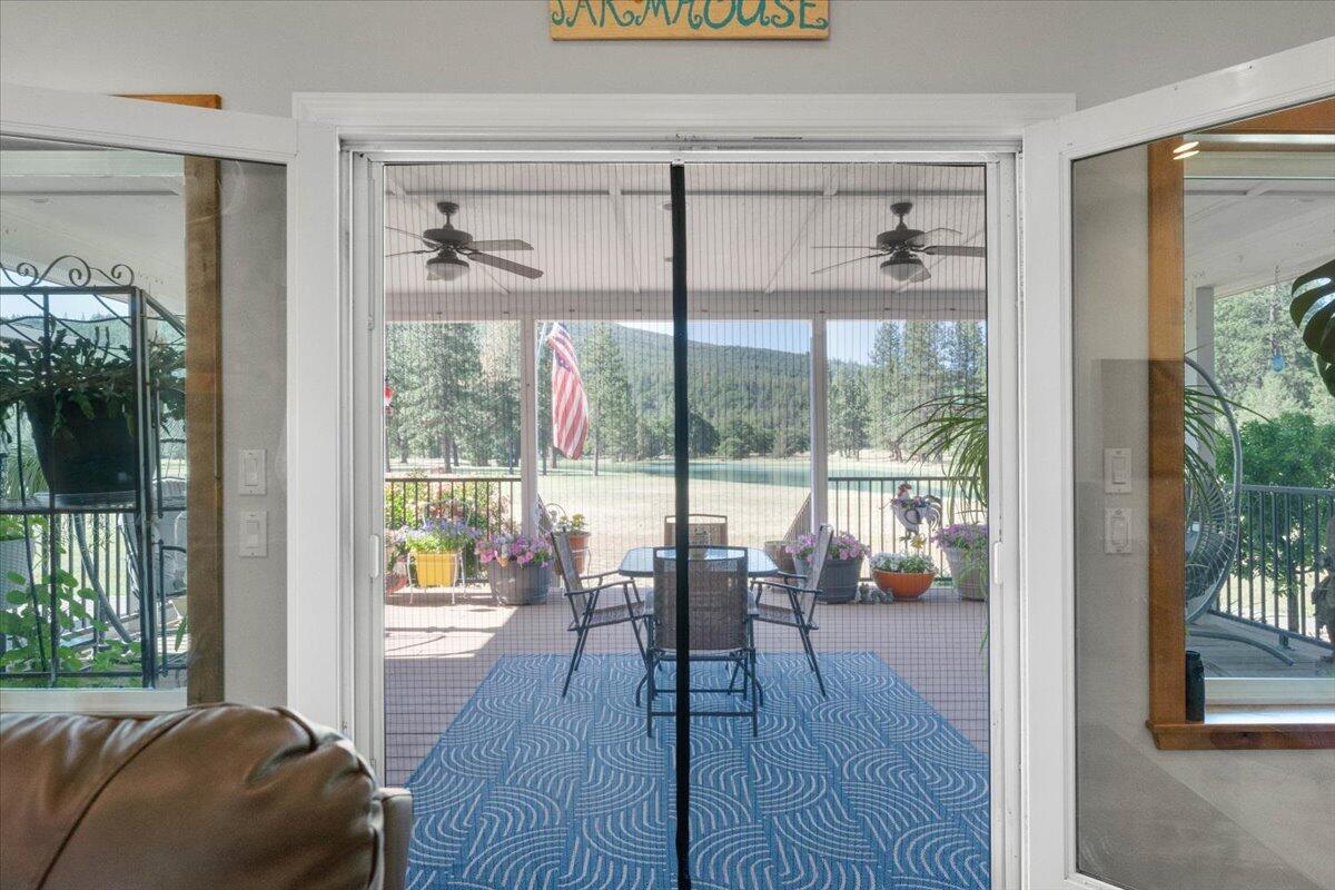 41494 Gomez Road Fall River Mills, CA 96028 - Photo 30 of 92 a living room with furniture and a window