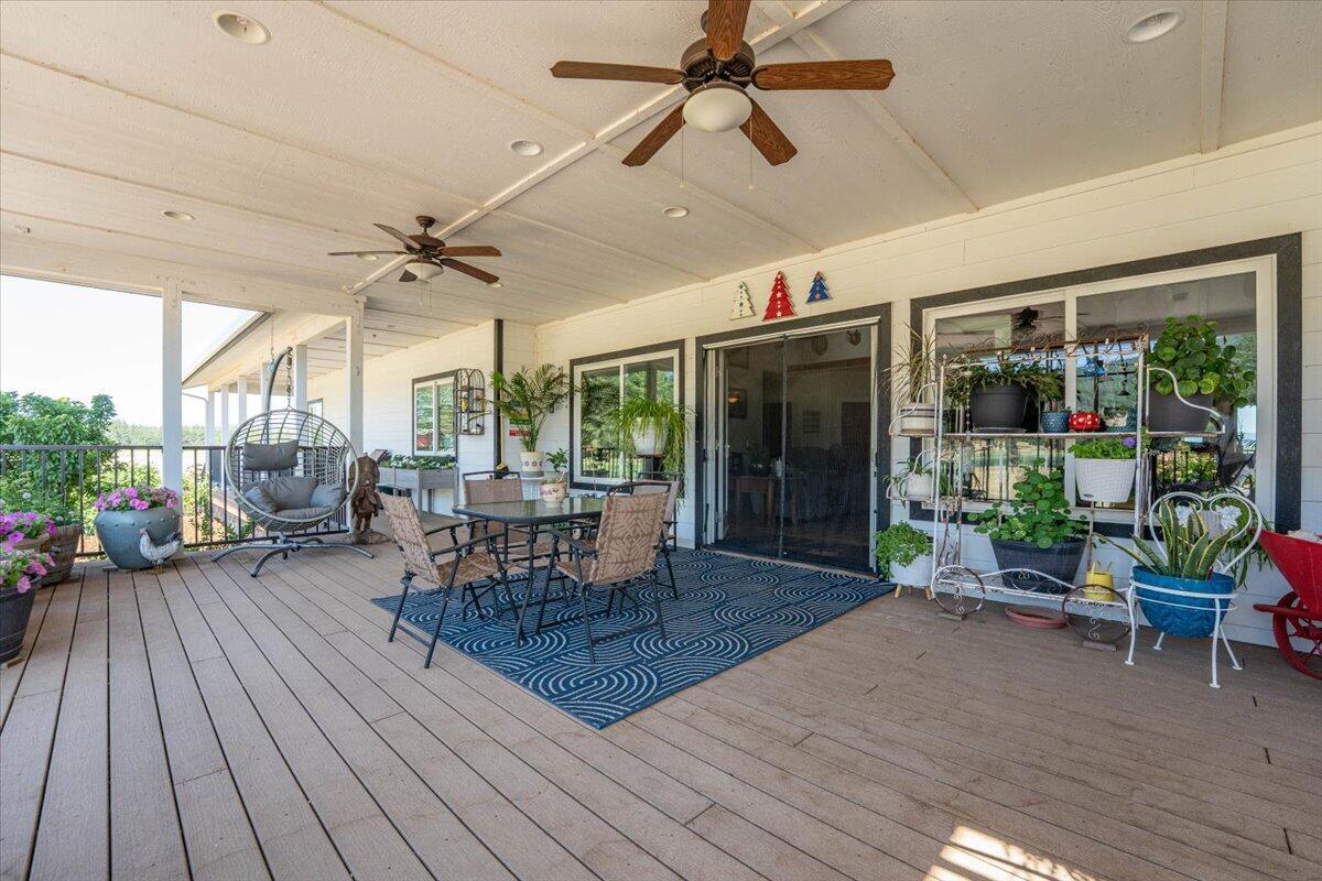 41494 Gomez Road Fall River Mills, CA 96028 - Photo 33 of 92 a view of a livingroom with furniture window and wooden floor