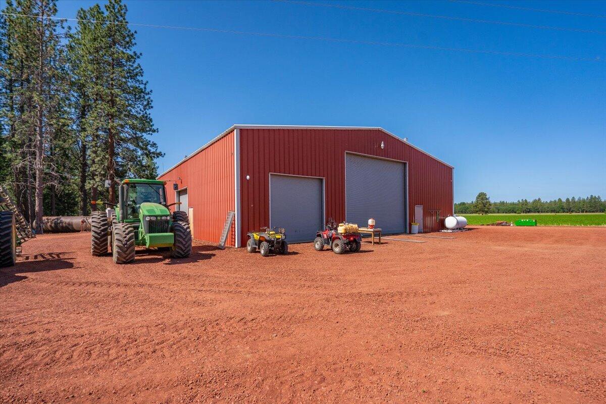 41494 Gomez Road Fall River Mills, CA 96028 - Photo 61 of 92 a view of a house with a yard and sitting area