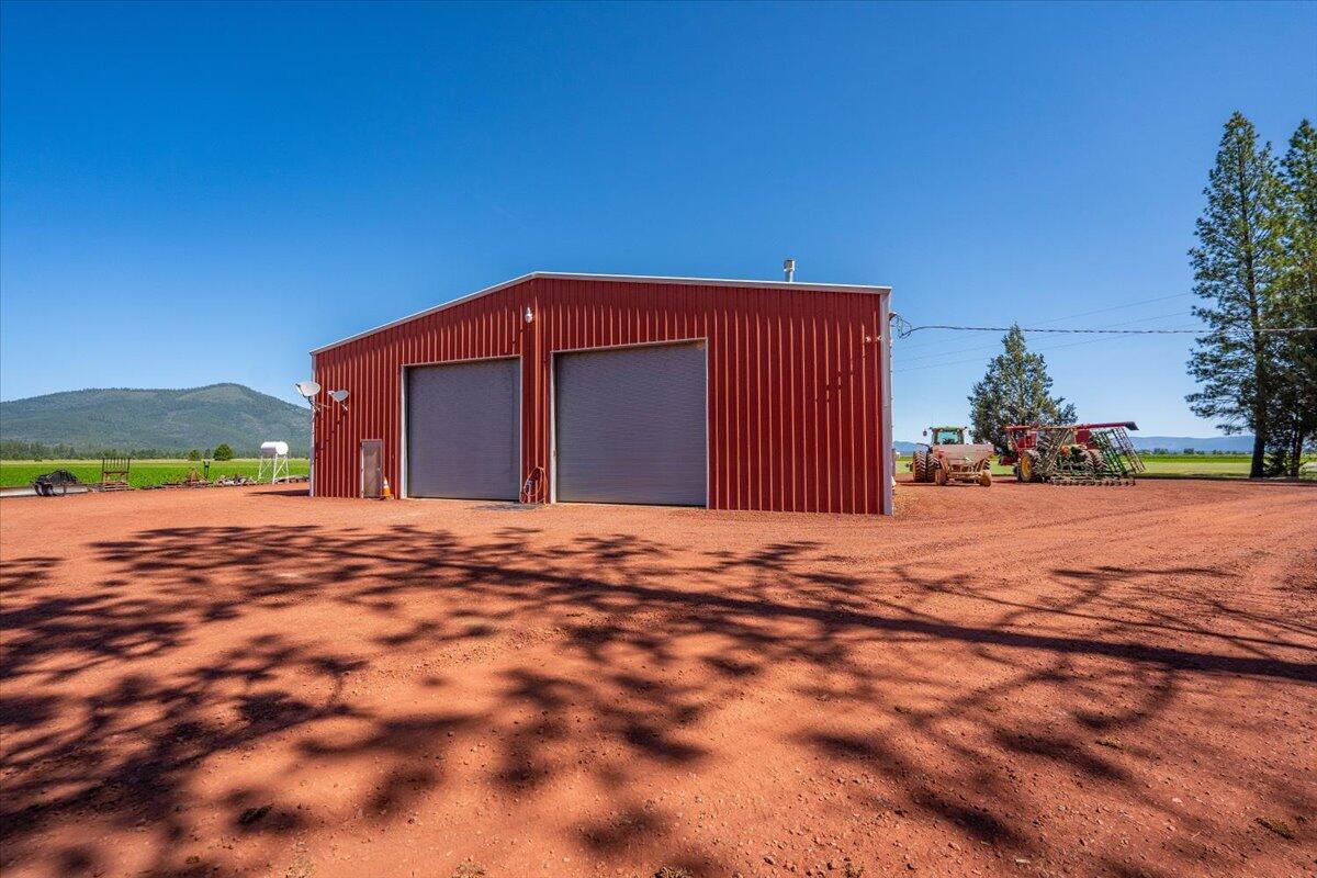 41494 Gomez Road Fall River Mills, CA 96028 - Photo 62 of 92 a front view of a house with a yard