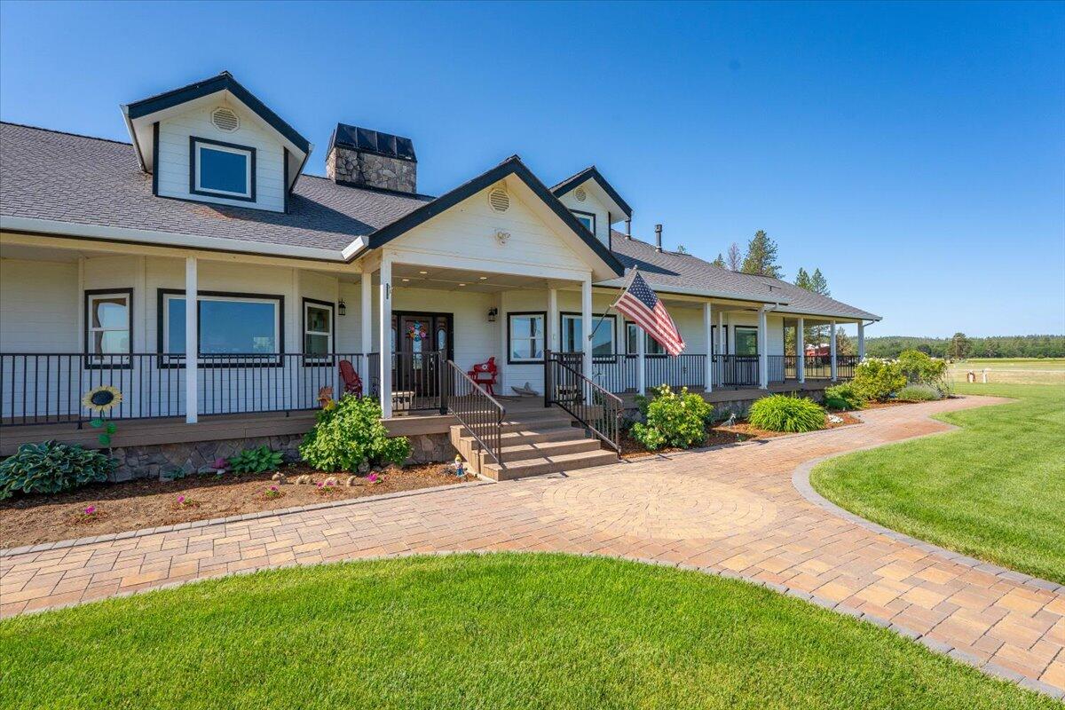 41494 Gomez Road Fall River Mills, CA 96028 - Photo 9 of 92 a view of a house with yard and plants
