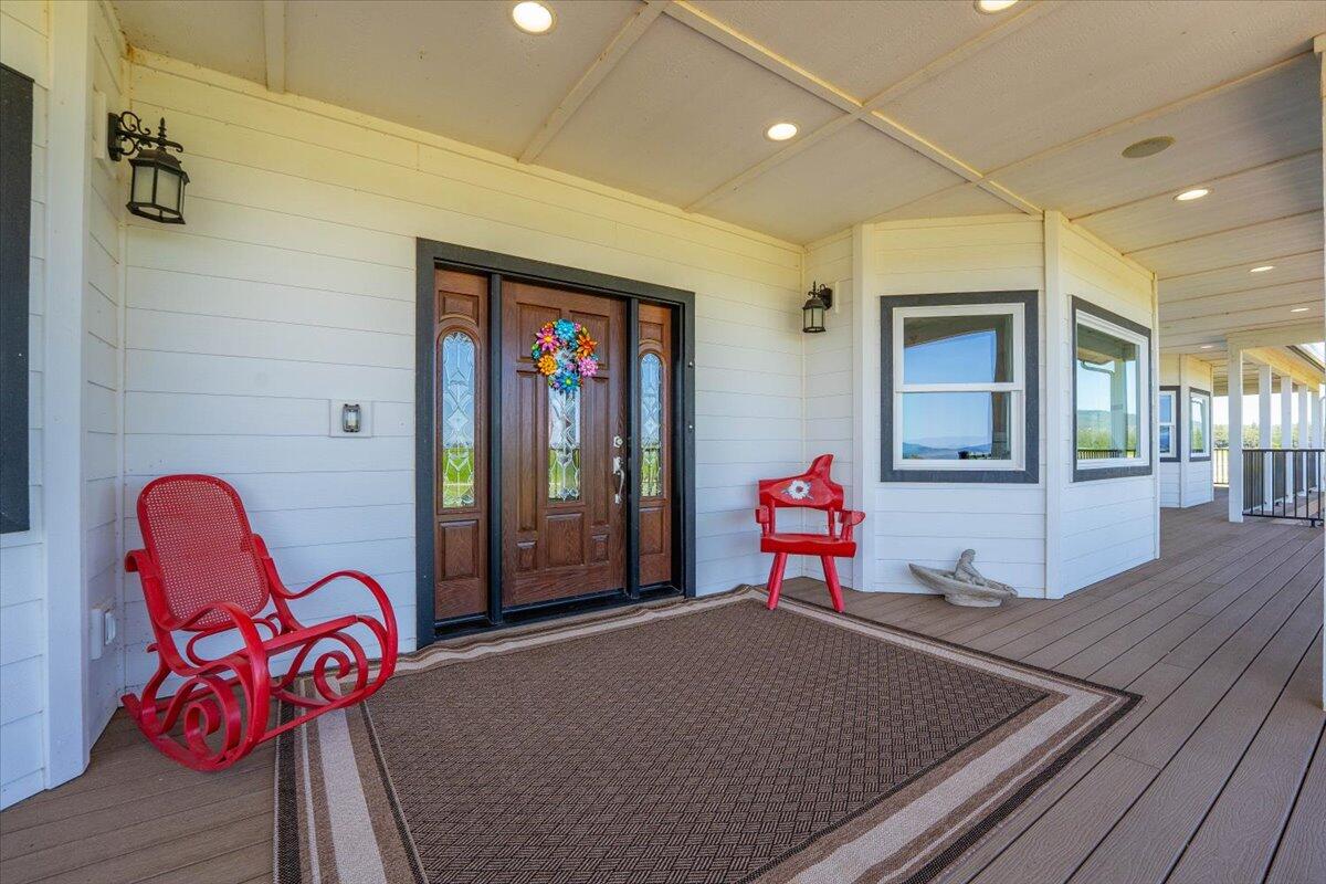41494 Gomez Road Fall River Mills, CA 96028 - Photo 10 of 92 a living room with furniture and a wooden floor