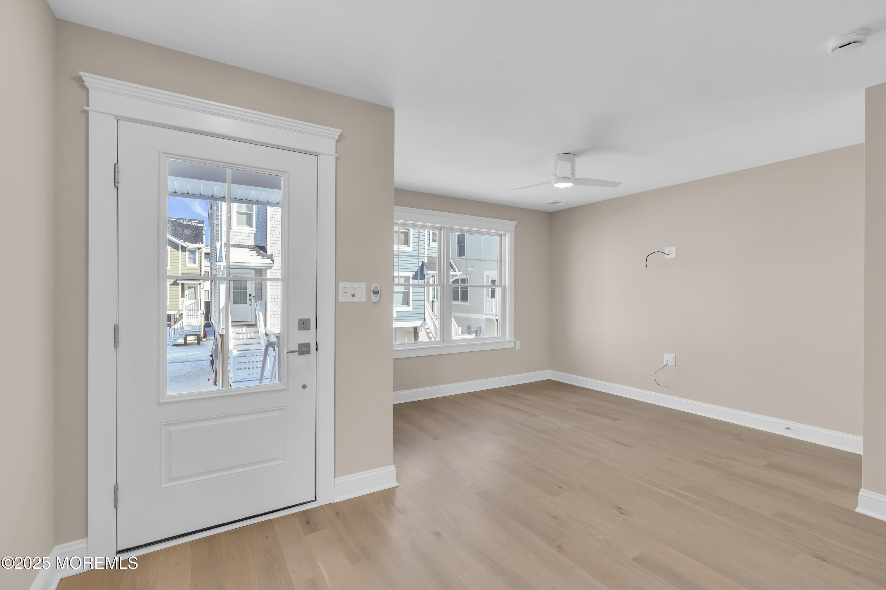 24 Shell Road, Unit 126 Mantoloking, NJ 08738 - Photo 19 of 31 an empty room with windows and closet