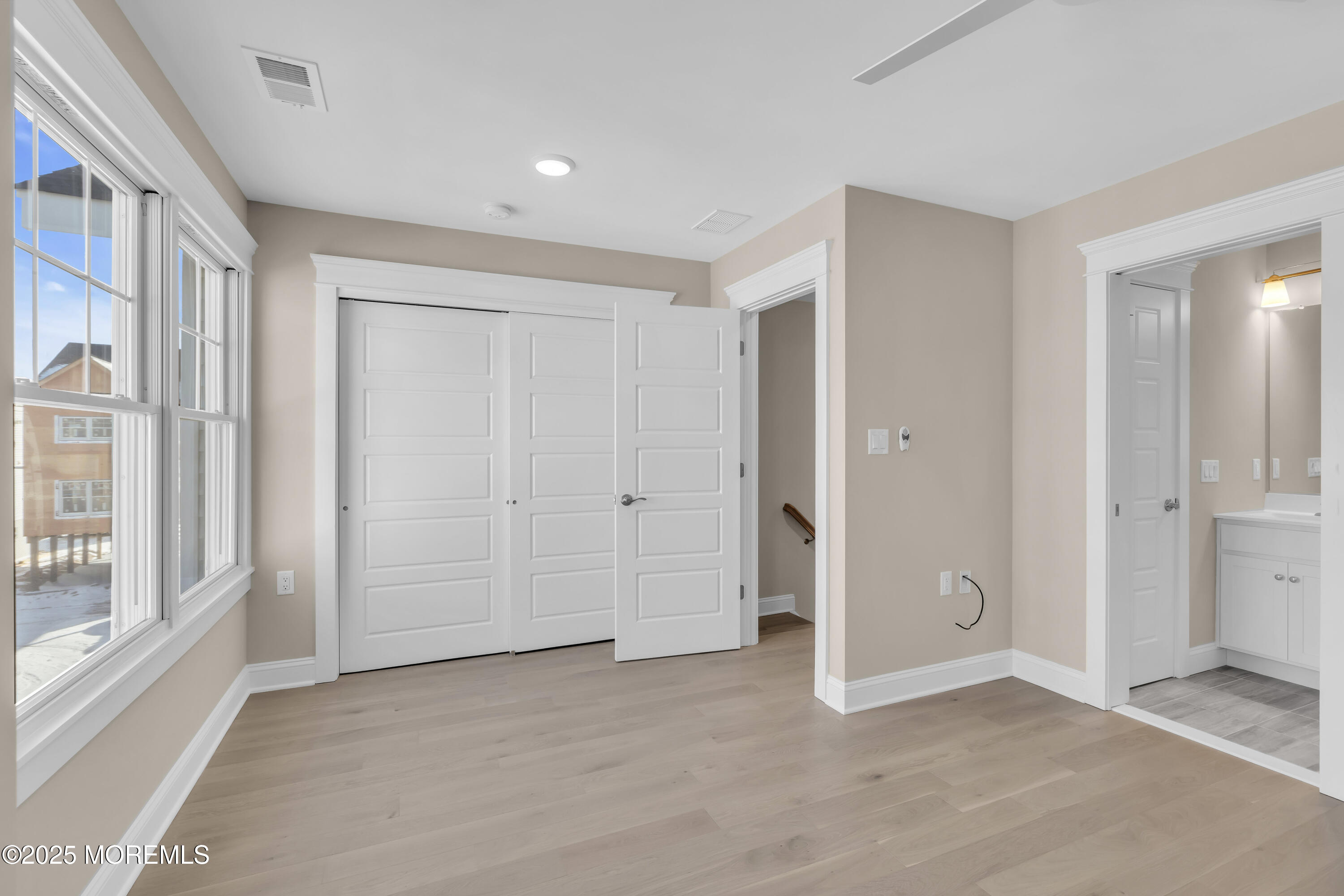 24 Shell Road, Unit 126 Mantoloking, NJ 08738 - Photo 24 of 31 an empty room with windows