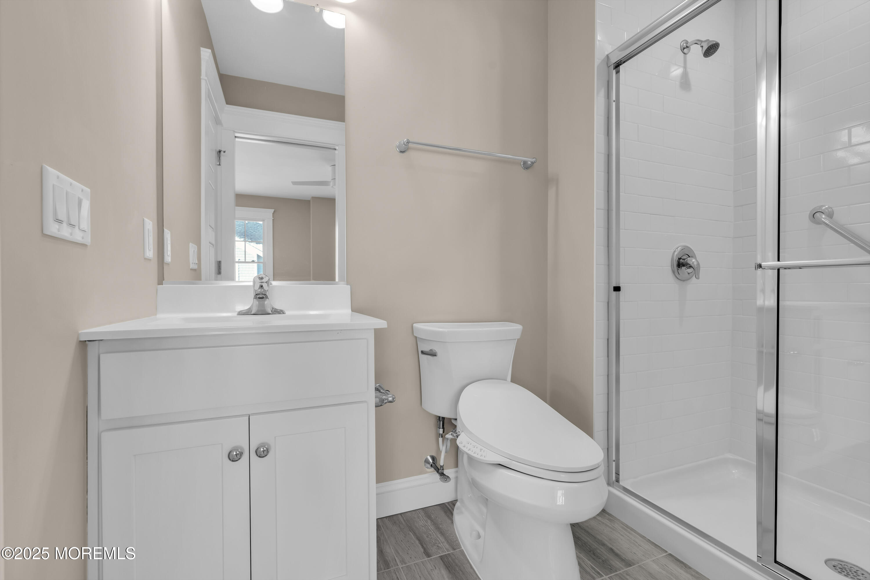 24 Shell Road, Unit 126 Mantoloking, NJ 08738 - Photo 28 of 31 a bathroom with a sink toilet and shower