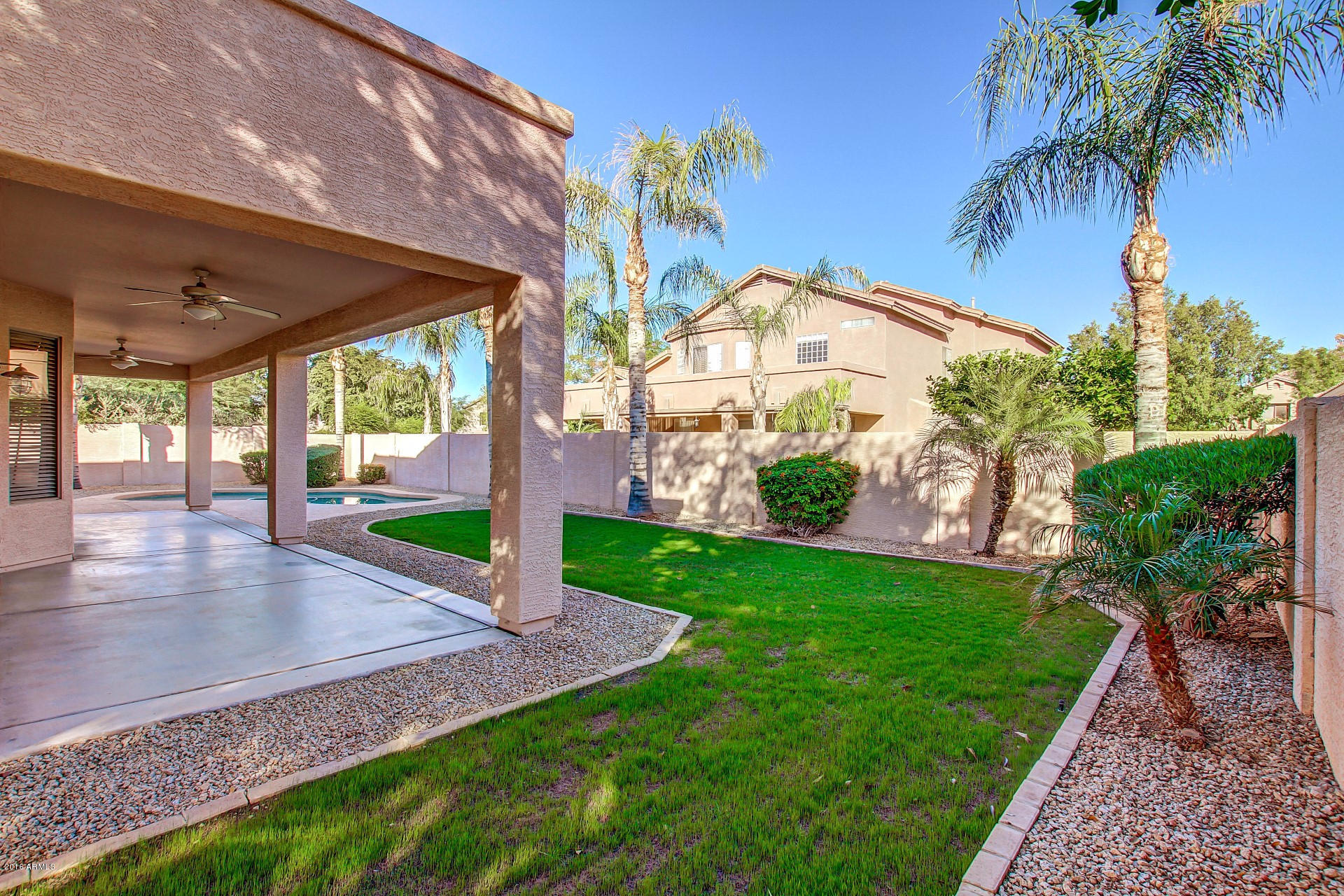 1360 East Harrison Street Gilbert, AZ 85295 - Photo 32 of 34 a view of a house with a yard
