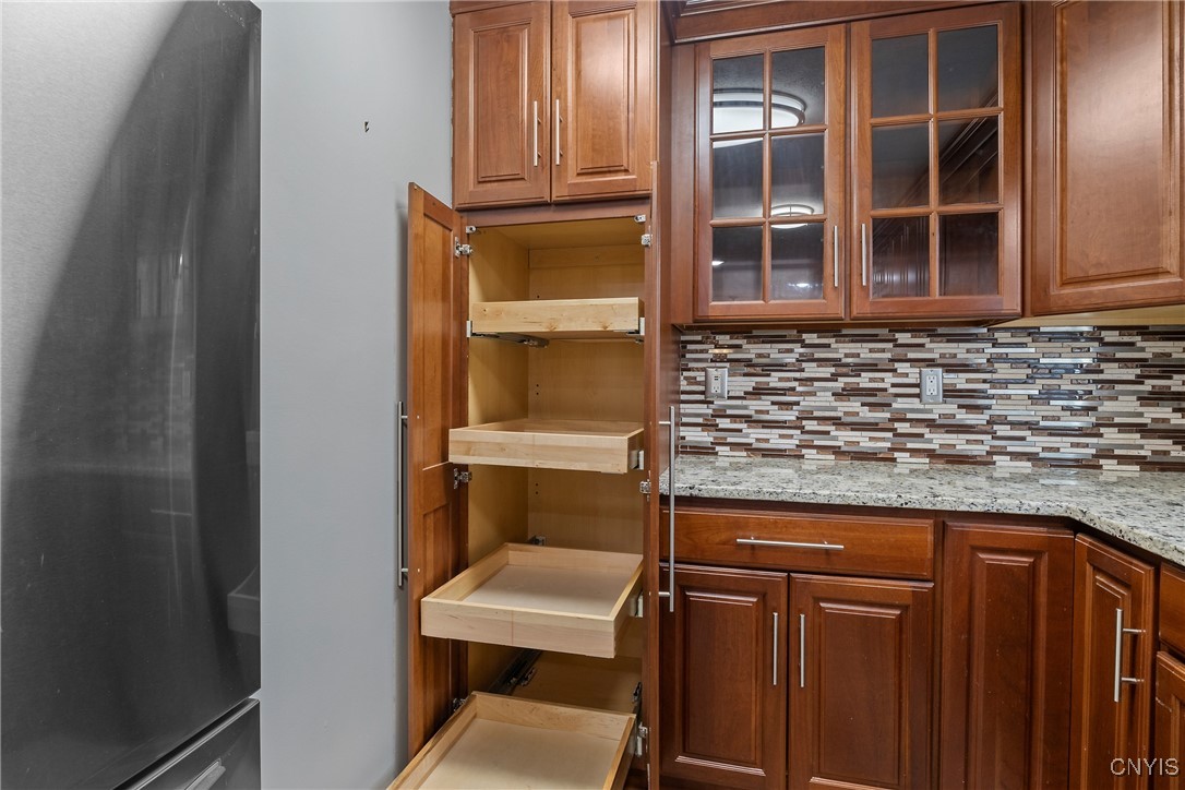 13 East Edgewater Drive Fulton, NY 13069 - Photo 11 of 37 Plenty of cabinetry and tile backsplash