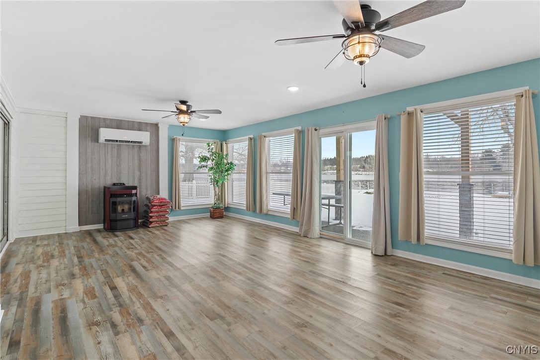 13 East Edgewater Drive Fulton, NY 13069 - Photo 13 of 37 Huge 4 season sunroom with pellet stove