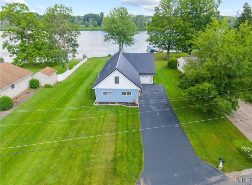 13 East Edgewater Drive Fulton, NY 13069 - Photo 33 of 37 Plenty of parking and attached garage. Plowing pro