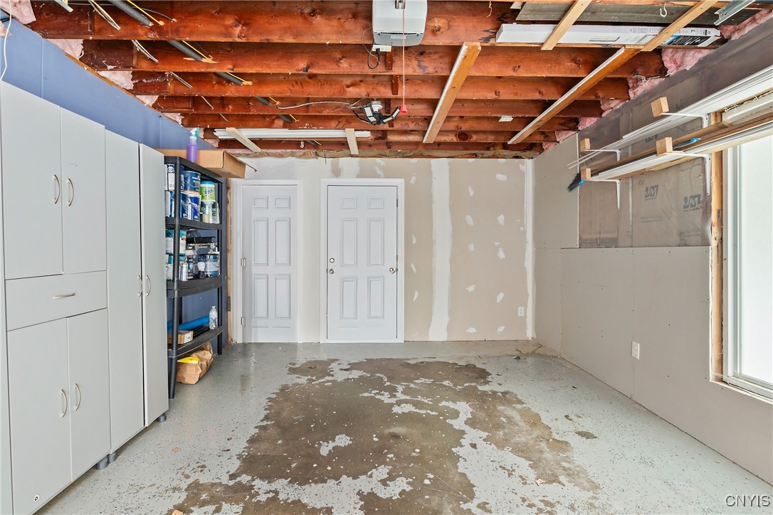 13 East Edgewater Drive Fulton, NY 13069 - Photo 34 of 37 Attached garage with storage closet