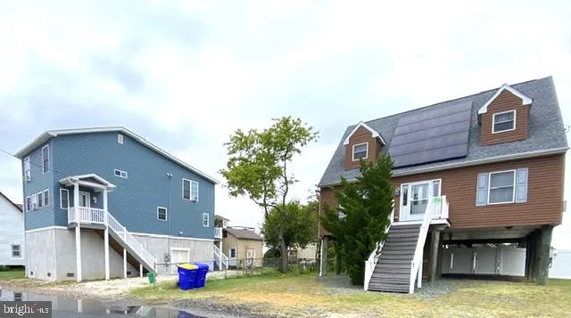 a view of a house with a roof deck