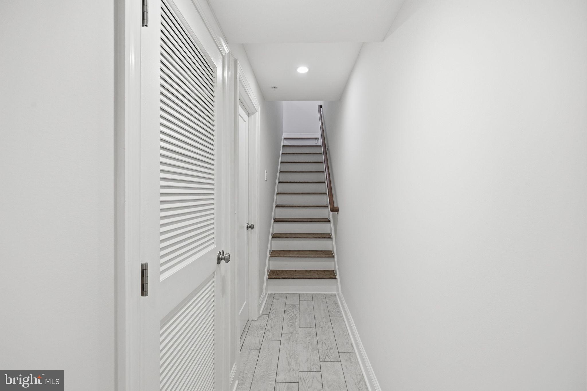 1820 Independence Avenue Southeast, Unit 1 Washington, DC 20003 - Photo 16 of 32 a view of a hallway with stairs
