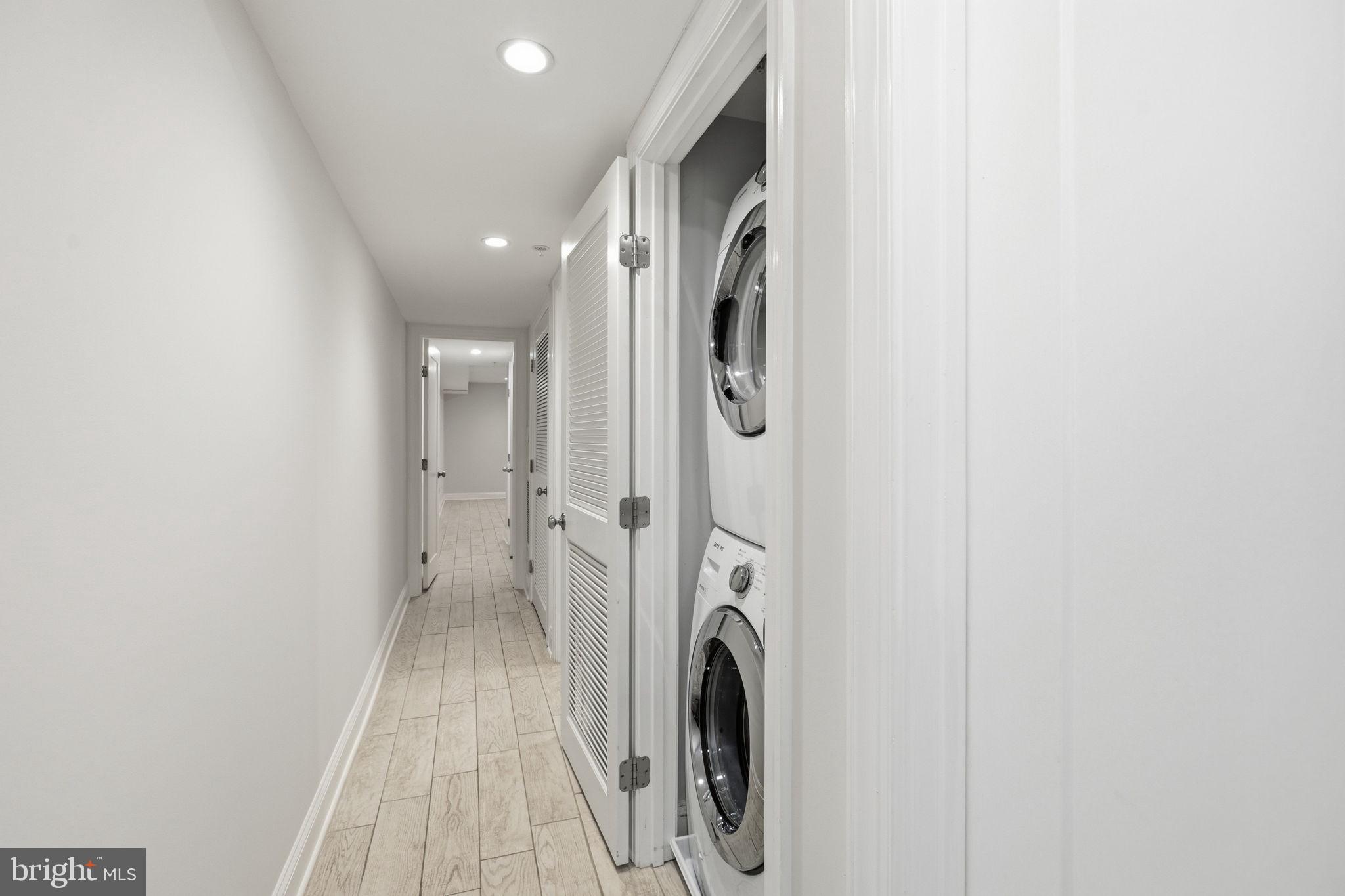 1820 Independence Avenue Southeast, Unit 1 Washington, DC 20003 - Photo 26 of 32 a view of a hallway with a washer and dryer