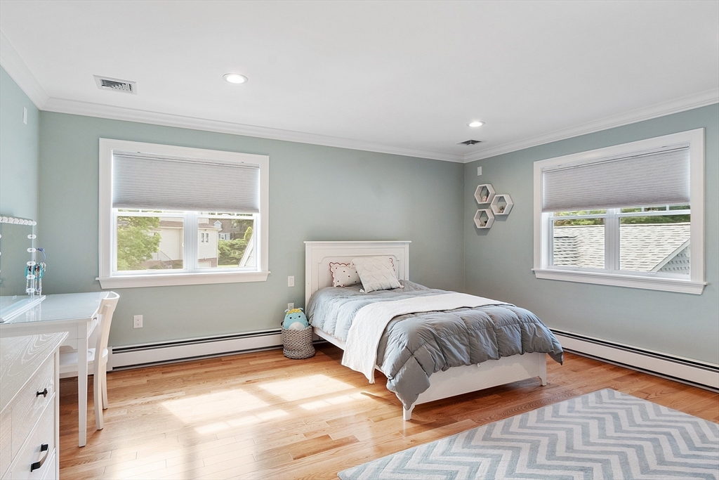 1 Colonial Road Lynnfield, MA 01940 - Photo 24 of 42 a bedroom with a bed and a window