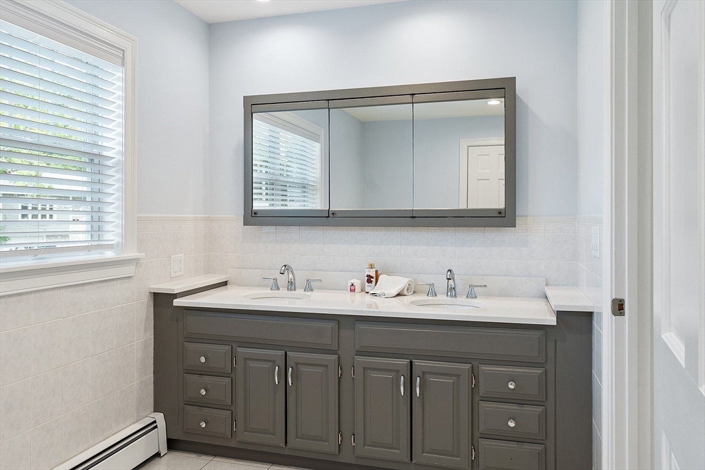 1 Colonial Road Lynnfield, MA 01940 - Photo 26 of 42 a bathroom with 2 sink and a mirror