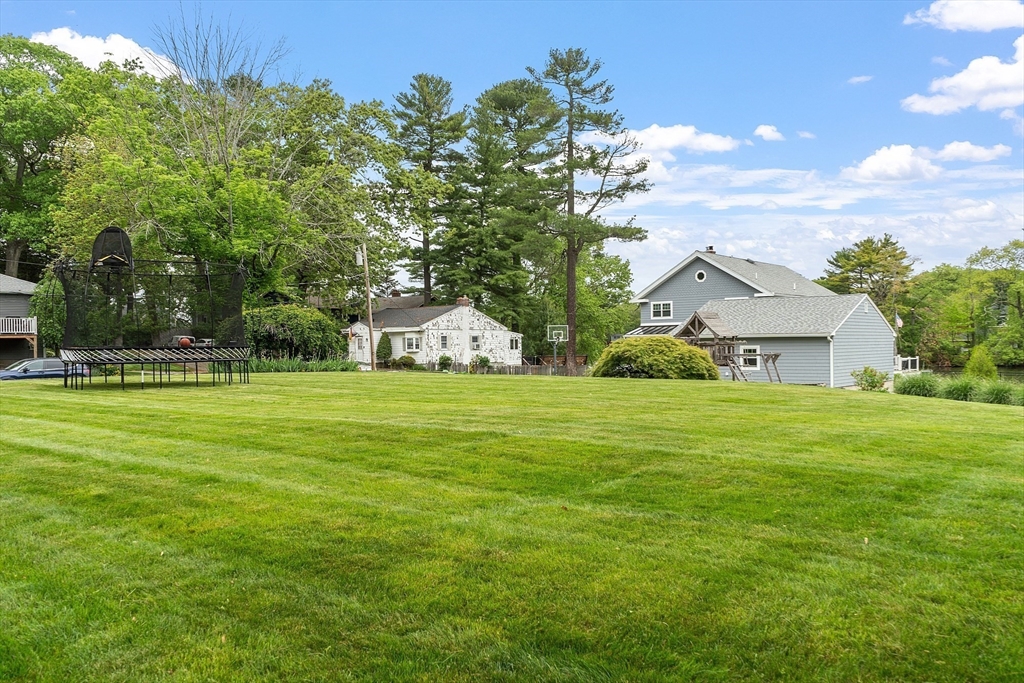 1 Colonial Road Lynnfield, MA 01940 - Photo 35 of 42 a view of a house with a big yard