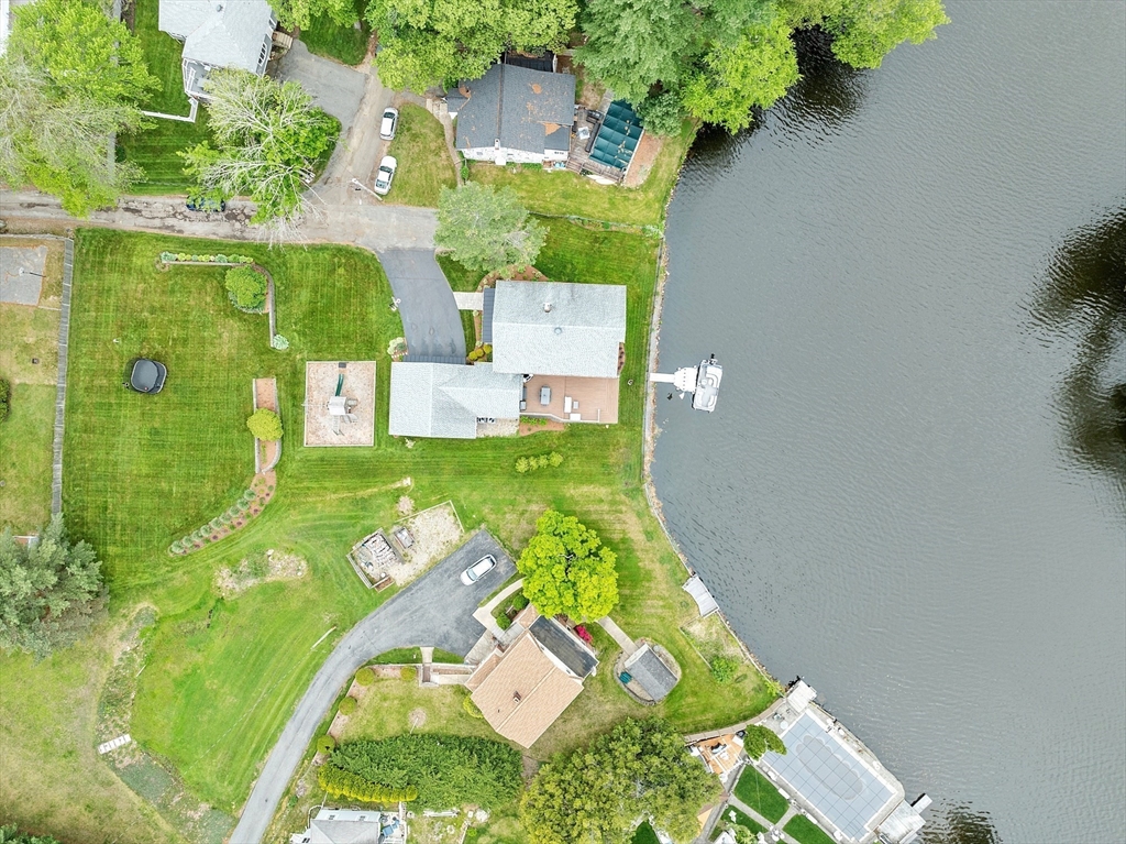 1 Colonial Road Lynnfield, MA 01940 - Photo 42 of 42 an aerial view of a house with pool yard seating area and yard