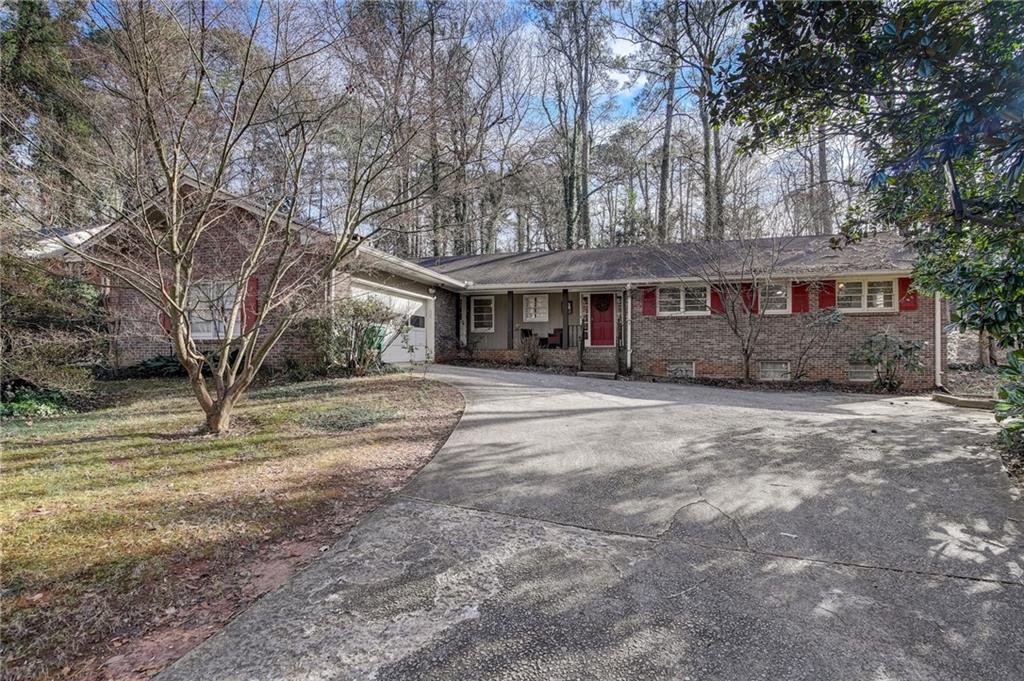 2533 McKinnon Drive Decatur, GA 30030 - Photo 1 of 1 a front view of a house with a yard