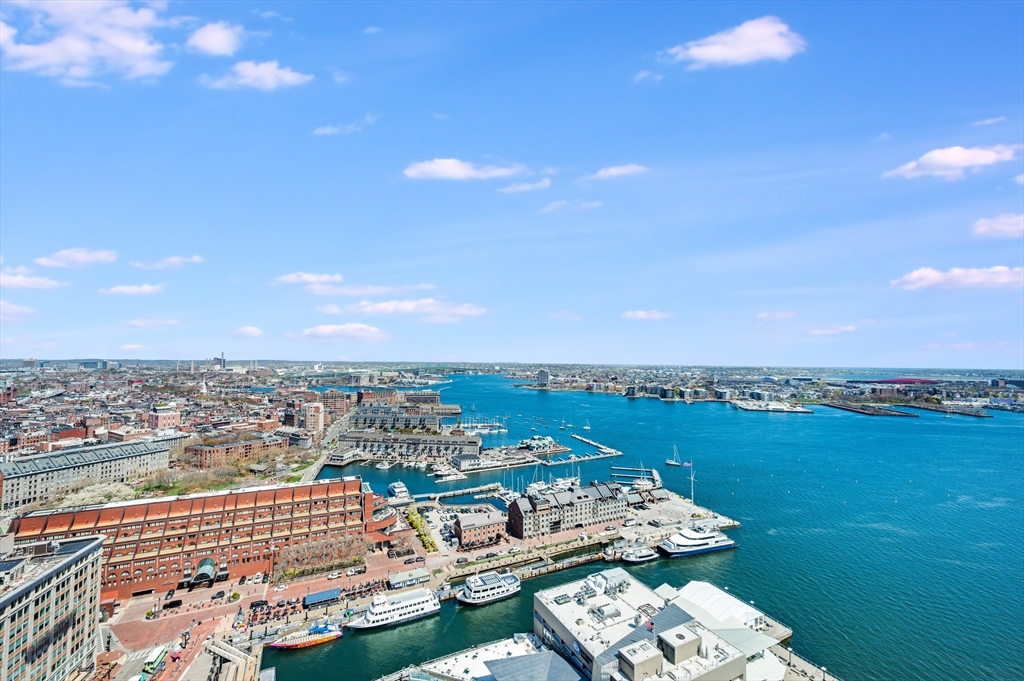 85 East India Row, Unit 34G Boston, MA 02110 - Photo 17 of 20 a view of a city and ocean view
