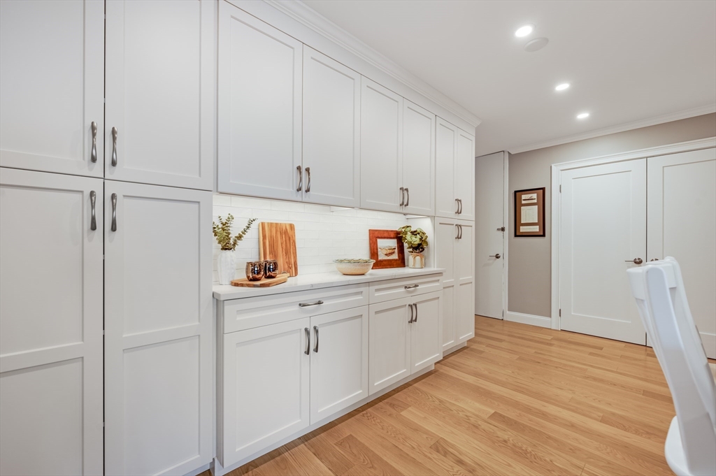 85 East India Row, Unit 34G Boston, MA 02110 - Photo 5 of 20 a kitchen with cabinets and window
