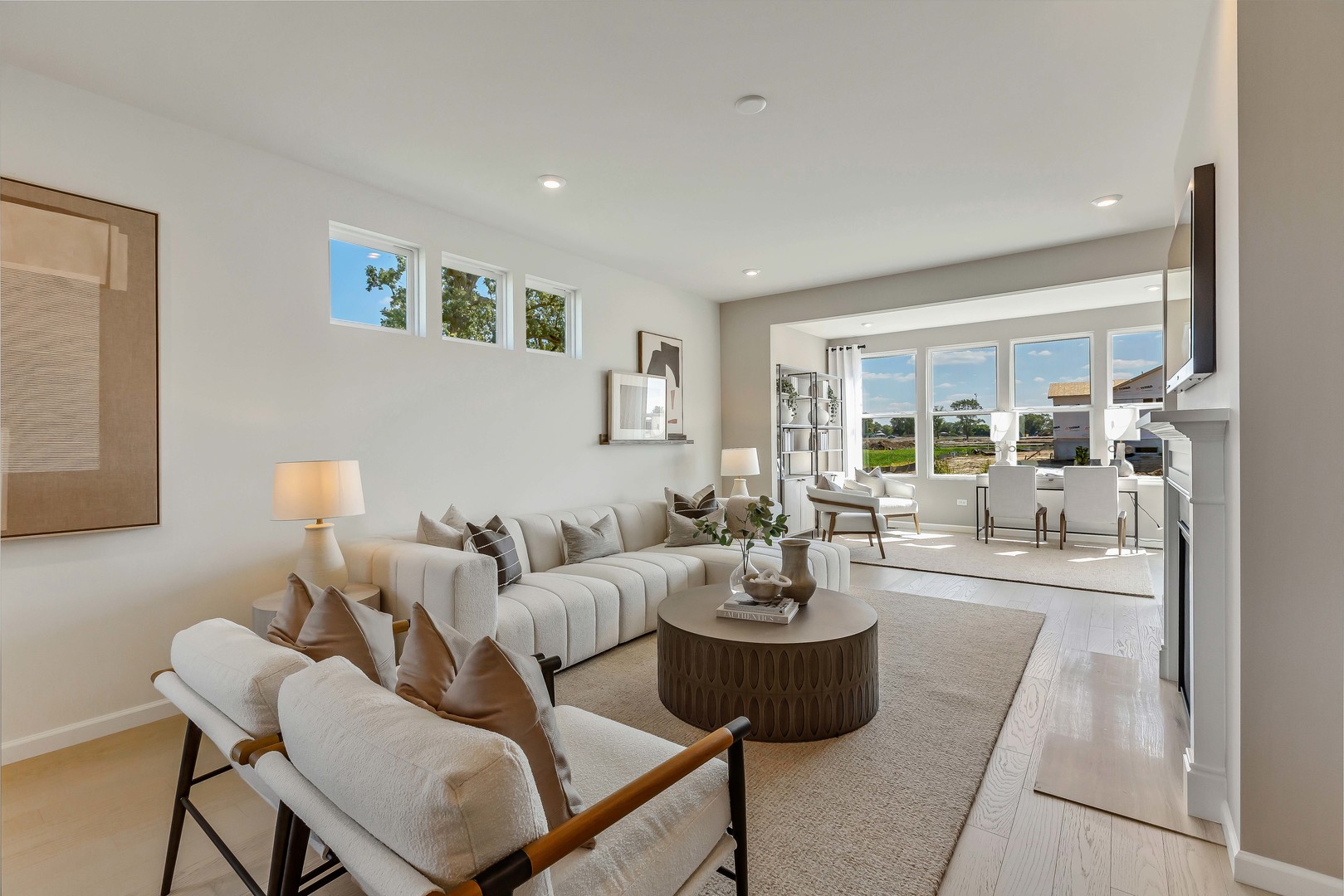 12644 Derry Drive, Unit 34201 Lemont, IL 60439 - Photo 9 of 16 a living room with furniture and a table