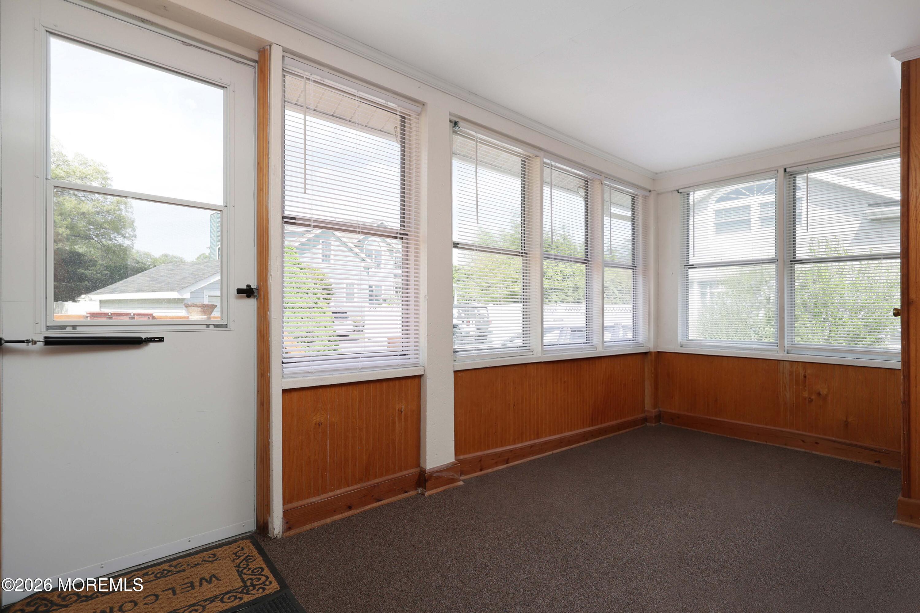 715 Howe Street Point Pleasant, NJ 08742 - Photo 15 of 45 a view of an empty room with a window