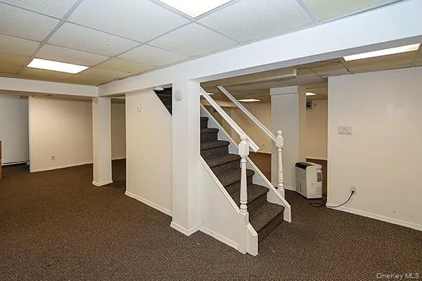 a view of a hallway with staircase