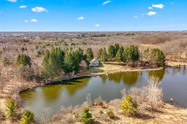 $699,000 | 2175 Bird Lake Road South, Osseo, MI 49266